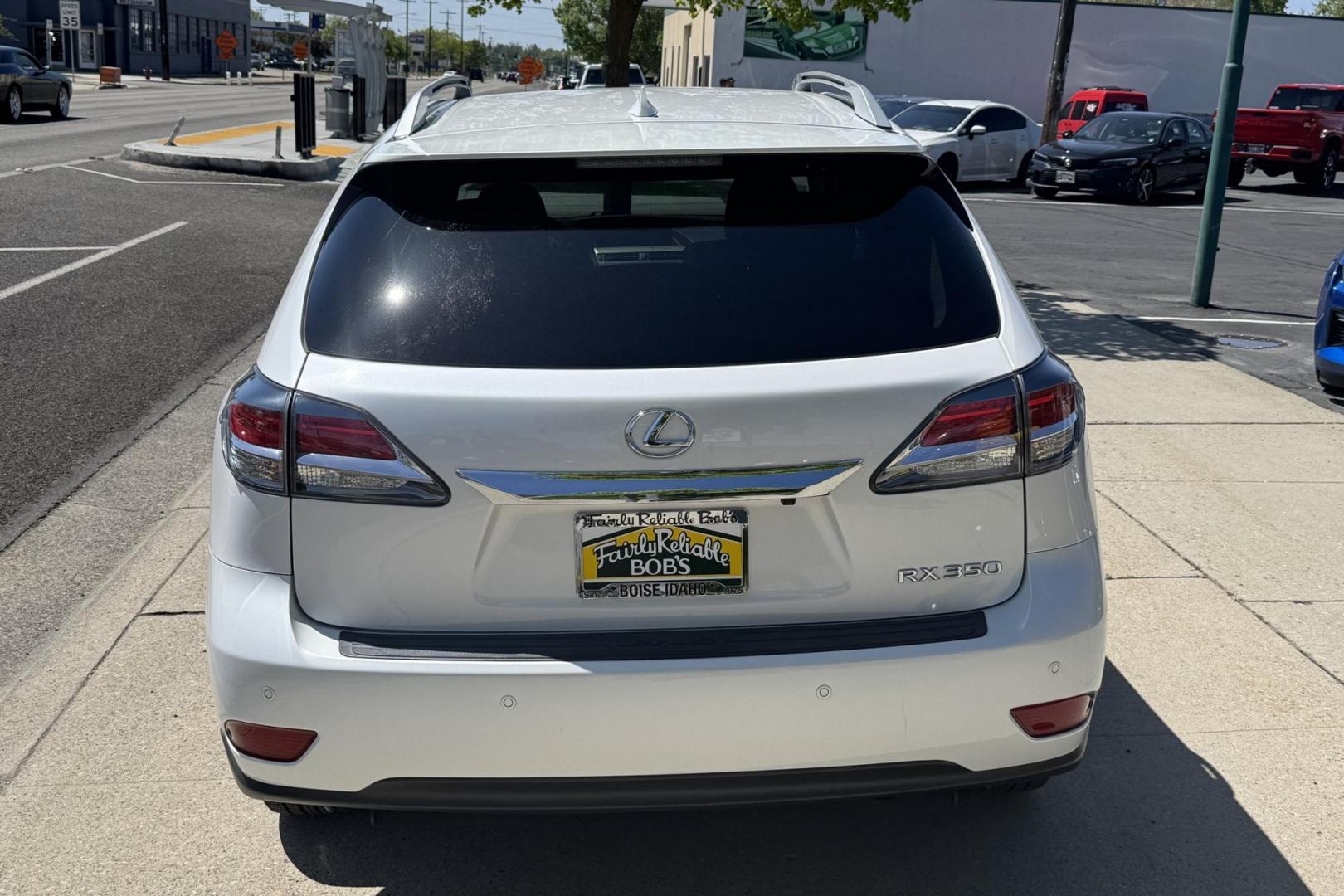 2015 Eminent White Pearl /Gray Lexus RX 350 (2T2BK1BA8FC) with an V6 3.5 Liter engine, Automatic 6 Speed transmission, located at 2304 W. Main St., Boise, ID, 83702, (208) 342-7777, 43.622105, -116.218658 - Outstanding Condition Lexus RX 350 With Only 36k Miles! - Photo#1