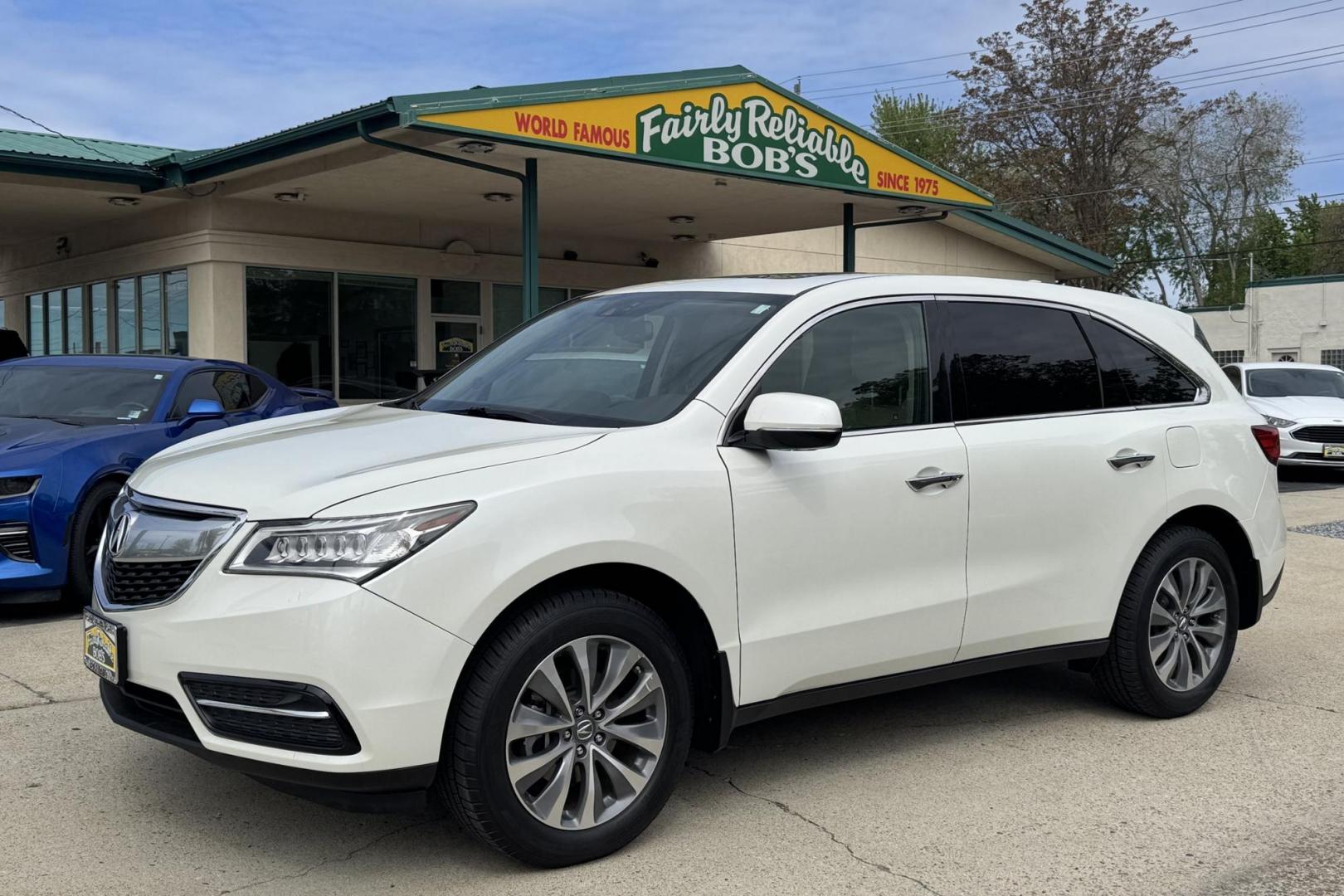 2015 White /Oak Acura MDX Tech (5FRYD4H49FB) with an V6 3.5 Liter engine, Automatic 6 Speed transmission, located at 2304 W. Main St., Boise, ID, 83702, (208) 342-7777, 43.622105, -116.218658 - New Tires! Well Maintained And Clean! - Photo#0
