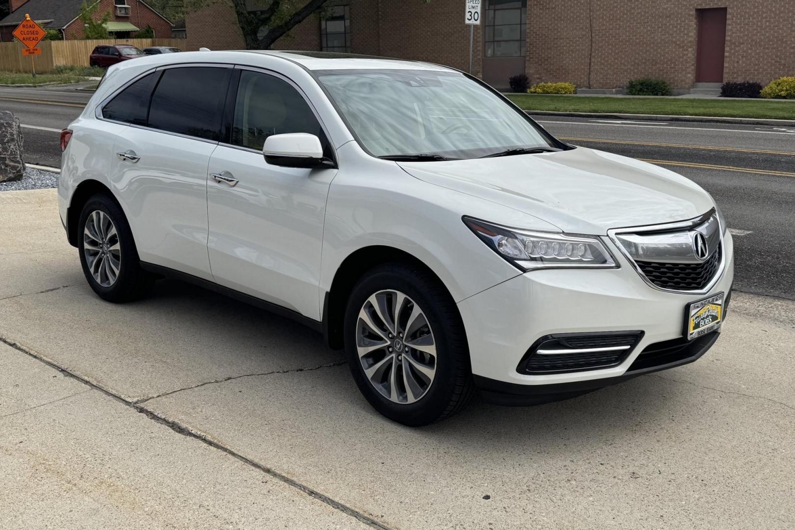 2015 White /Oak Acura MDX Tech (5FRYD4H49FB) with an V6 3.5 Liter engine, Automatic 6 Speed transmission, located at 2304 W. Main St., Boise, ID, 83702, (208) 342-7777, 43.622105, -116.218658 - New Tires! Well Maintained And Clean! - Photo#2