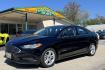 2018 Black /Tan Ford Fusion (3FA6P0UU8JR) with an 4 Cyl 2.0 Liter Hybrid engine, Automatic transmission, located at 2304 W. Main St., Boise, ID, 83702, (208) 342-7777, 43.622105, -116.218658 - Great Fuel Economy! Great Value! - Photo#0