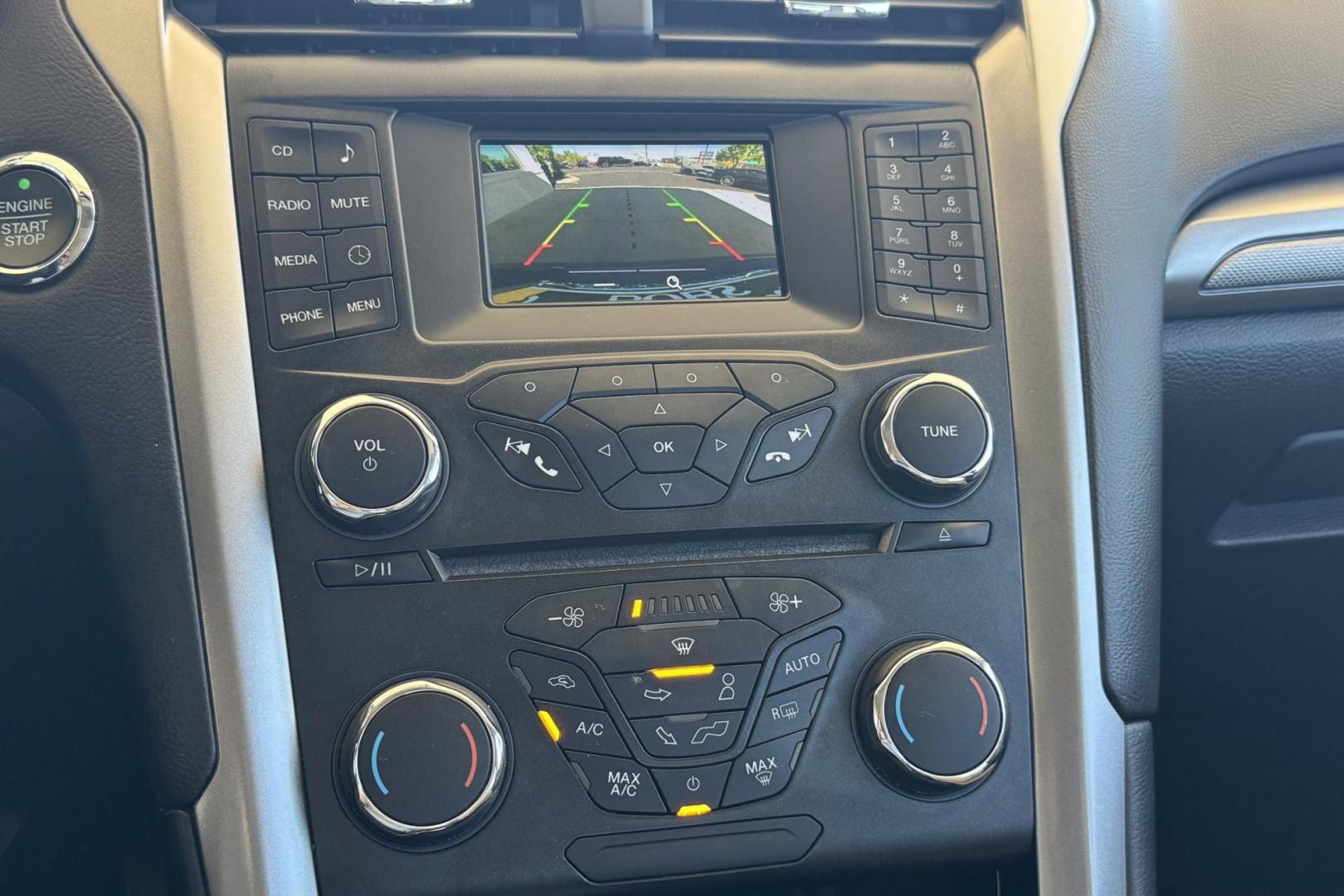 2018 Black /Tan Ford Fusion (3FA6P0UU8JR) with an 4 Cyl 2.0 Liter Hybrid engine, Automatic transmission, located at 2304 W. Main St., Boise, ID, 83702, (208) 342-7777, 43.622105, -116.218658 - Great Fuel Economy! Great Value! - Photo#4