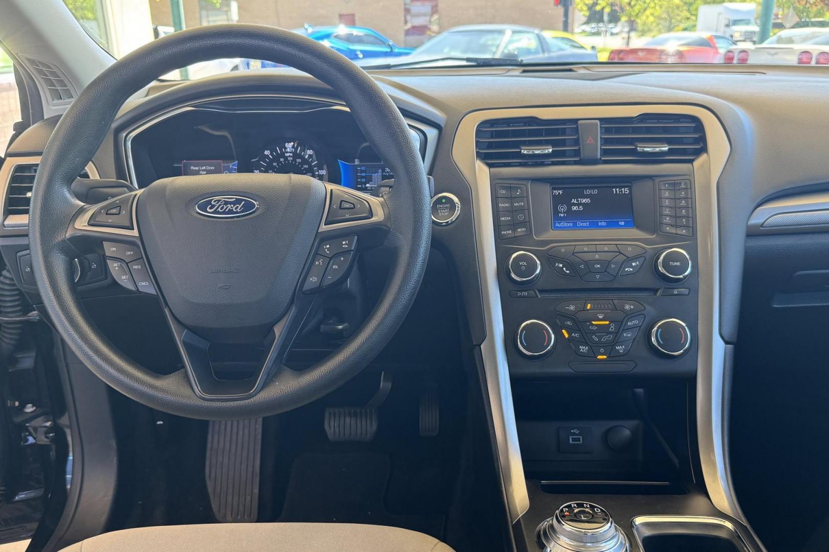 2018 Black /Tan Ford Fusion (3FA6P0UU8JR) with an 4 Cyl 2.0 Liter Hybrid engine, Automatic transmission, located at 2304 W. Main St., Boise, ID, 83702, (208) 342-7777, 43.622105, -116.218658 - Great Fuel Economy! Great Value! - Photo#8