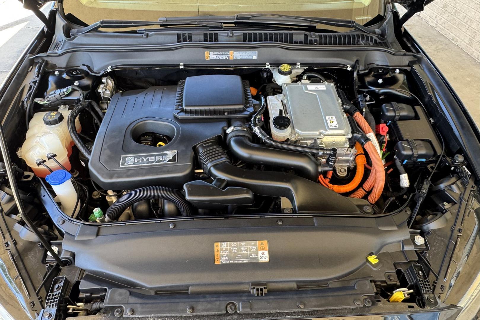 2018 Black /Tan Ford Fusion (3FA6P0UU8JR) with an 4 Cyl 2.0 Liter Hybrid engine, Automatic transmission, located at 2304 W. Main St., Boise, ID, 83702, (208) 342-7777, 43.622105, -116.218658 - Great Fuel Economy! Great Value! - Photo#10