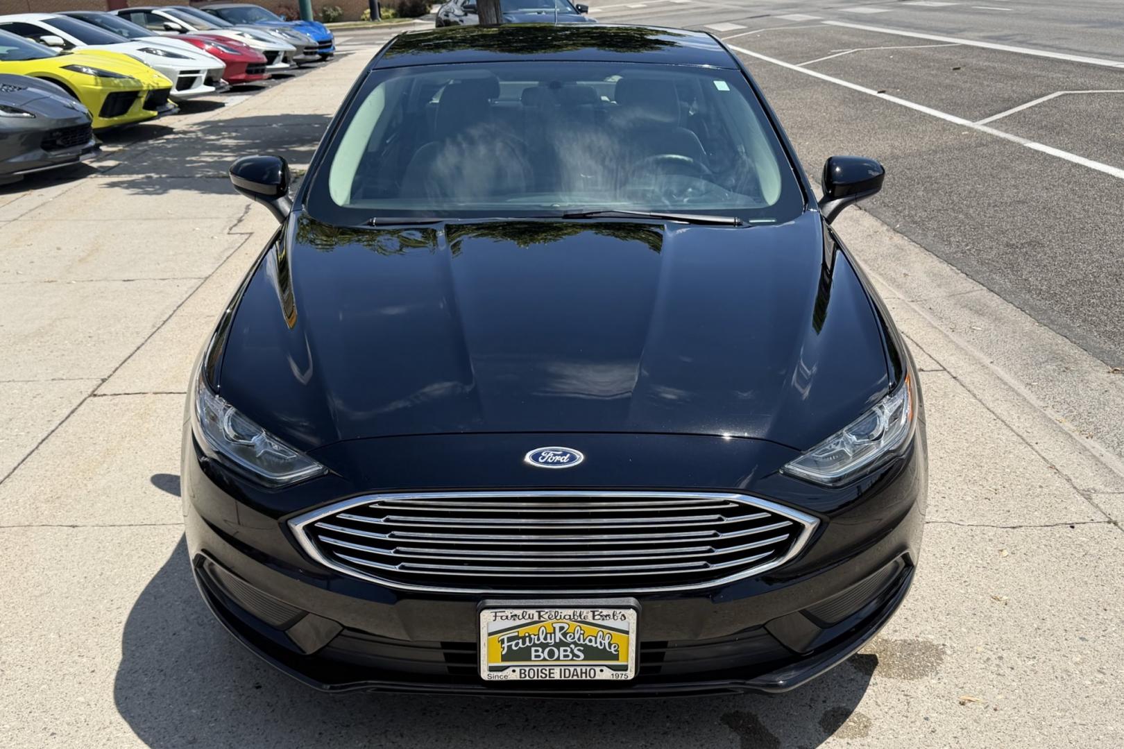 2018 Black /Gray Ford Fusion (3FA6P0UU8JR) with an 4 Cyl 2.0 Liter Hybrid engine, Automatic transmission, located at 2304 W. Main St., Boise, ID, 83702, (208) 342-7777, 43.622105, -116.218658 - Great Fuel Economy! Great Value!- Photo#3