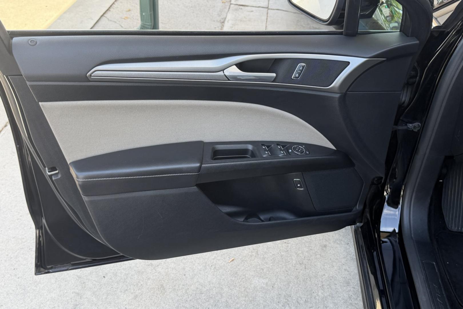 2018 Black /Gray Ford Fusion (3FA6P0UU8JR) with an 4 Cyl 2.0 Liter Hybrid engine, Automatic transmission, located at 2304 W. Main St., Boise, ID, 83702, (208) 342-7777, 43.622105, -116.218658 - Great Fuel Economy! Great Value!- Photo#4