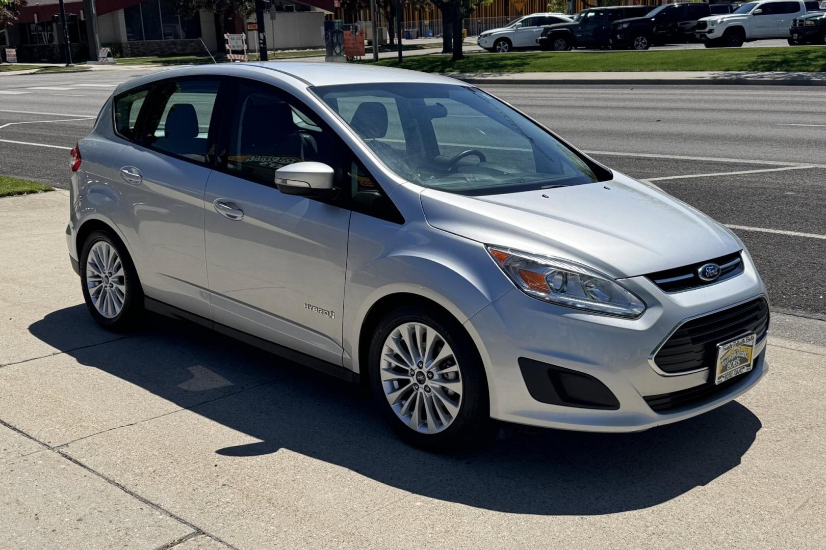 2017 Silver /Gray Ford C-Max Hybrid SE (1FADP5AU1HL) with an 4 Cyl 2.0 Liter Hybrid engine, Automatic transmission, located at 2304 W. Main St., Boise, ID, 83702, (208) 342-7777, 43.622105, -116.218658 - New Tires! Great Gas Mileage! Solid Option! - Photo#2