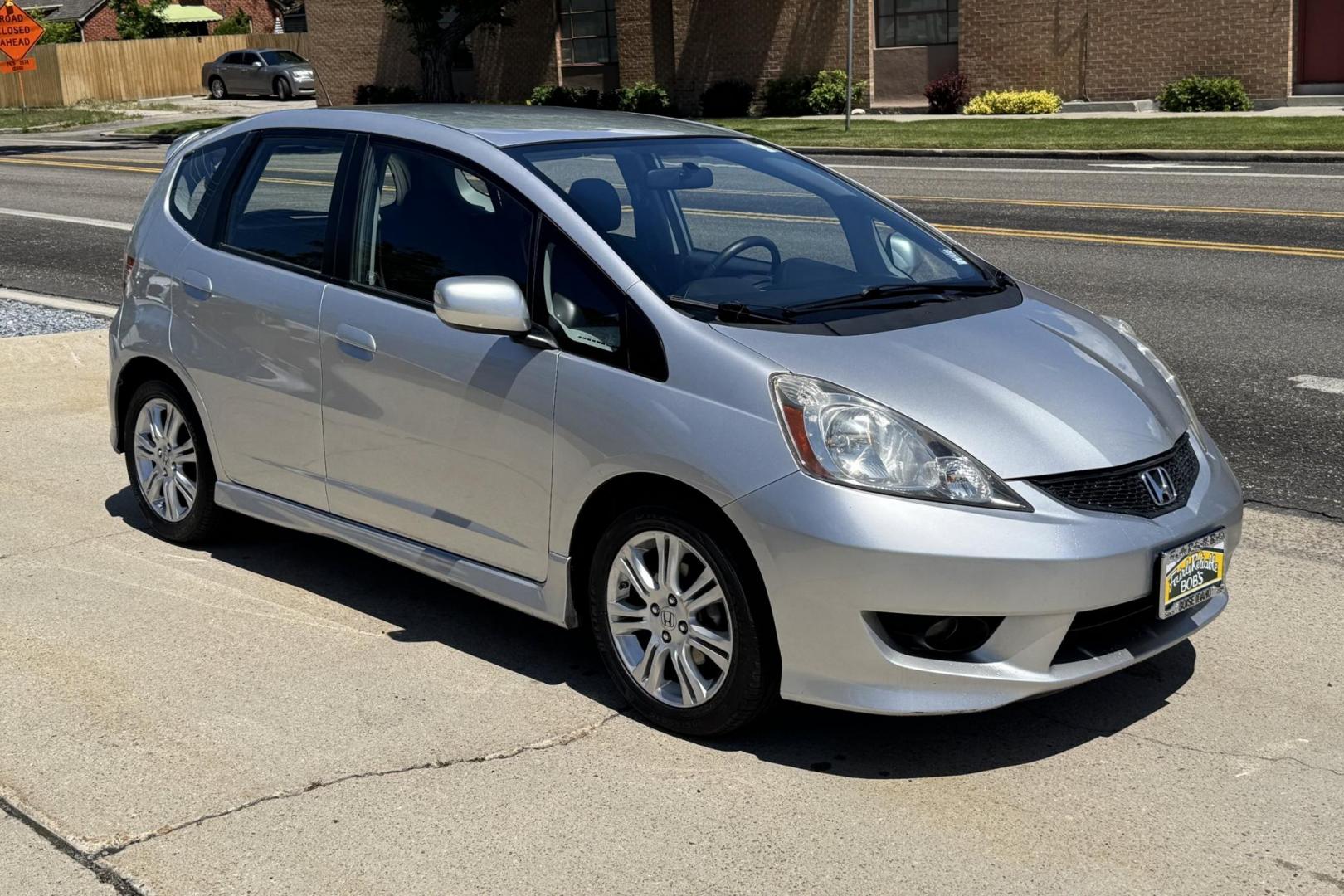 2011 Silver /Black Honda Fit Sport (JHMGE8G59BC) with an 4 Cyl 1.5 Liter engine, 5 Speed Manual transmission, located at 2304 W. Main St., Boise, ID, 83702, (208) 342-7777, 43.622105, -116.218658 - 5 Speed, Great Fuel Economy! - Photo#2