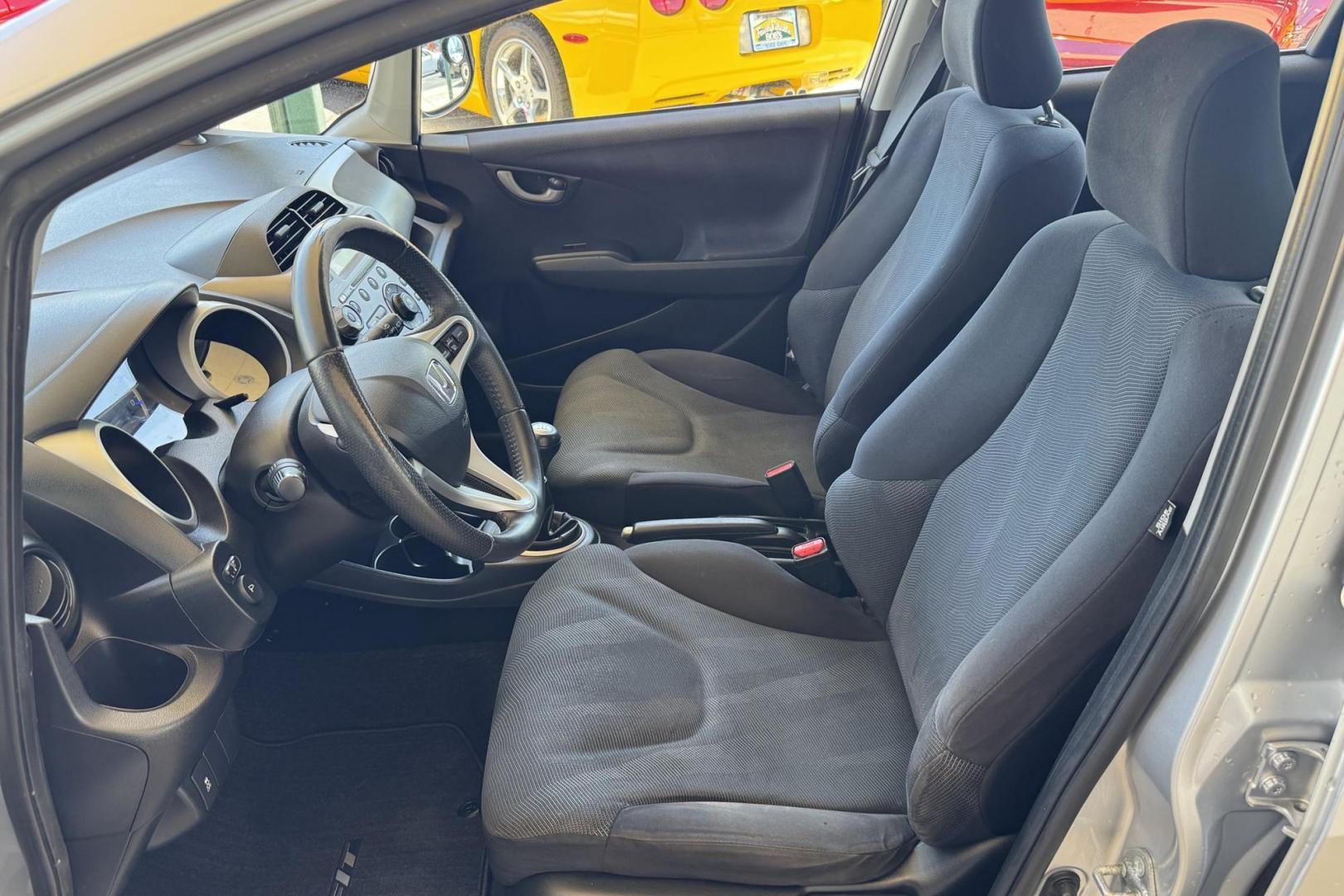 2011 Silver /Black Honda Fit Sport (JHMGE8G59BC) with an 4 Cyl 1.5 Liter engine, 5 Speed Manual transmission, located at 2304 W. Main St., Boise, ID, 83702, (208) 342-7777, 43.622105, -116.218658 - 5 Speed, Great Fuel Economy! - Photo#5
