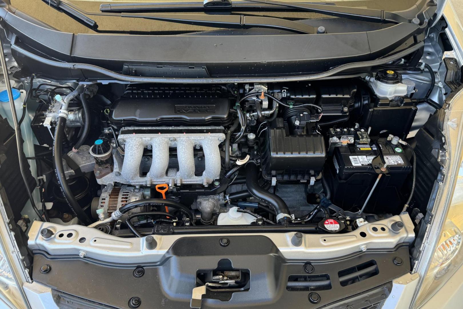2011 Silver /Black Honda Fit Sport (JHMGE8G59BC) with an 4 Cyl 1.5 Liter engine, 5 Speed Manual transmission, located at 2304 W. Main St., Boise, ID, 83702, (208) 342-7777, 43.622105, -116.218658 - 5 Speed, Great Fuel Economy! - Photo#9