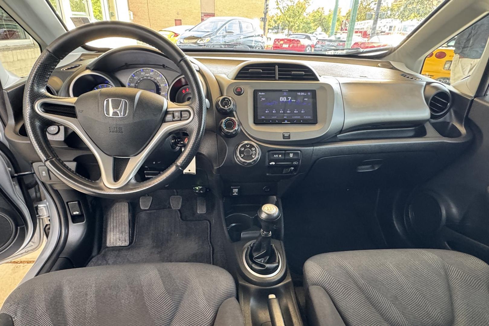 2011 Silver /Black Honda Fit Sport (JHMGE8G59BC) with an 4 Cyl 1.5 Liter engine, 5 Speed Manual transmission, located at 2304 W. Main St., Boise, ID, 83702, (208) 342-7777, 43.622105, -116.218658 - 5 Speed, Great Fuel Economy! - Photo#10