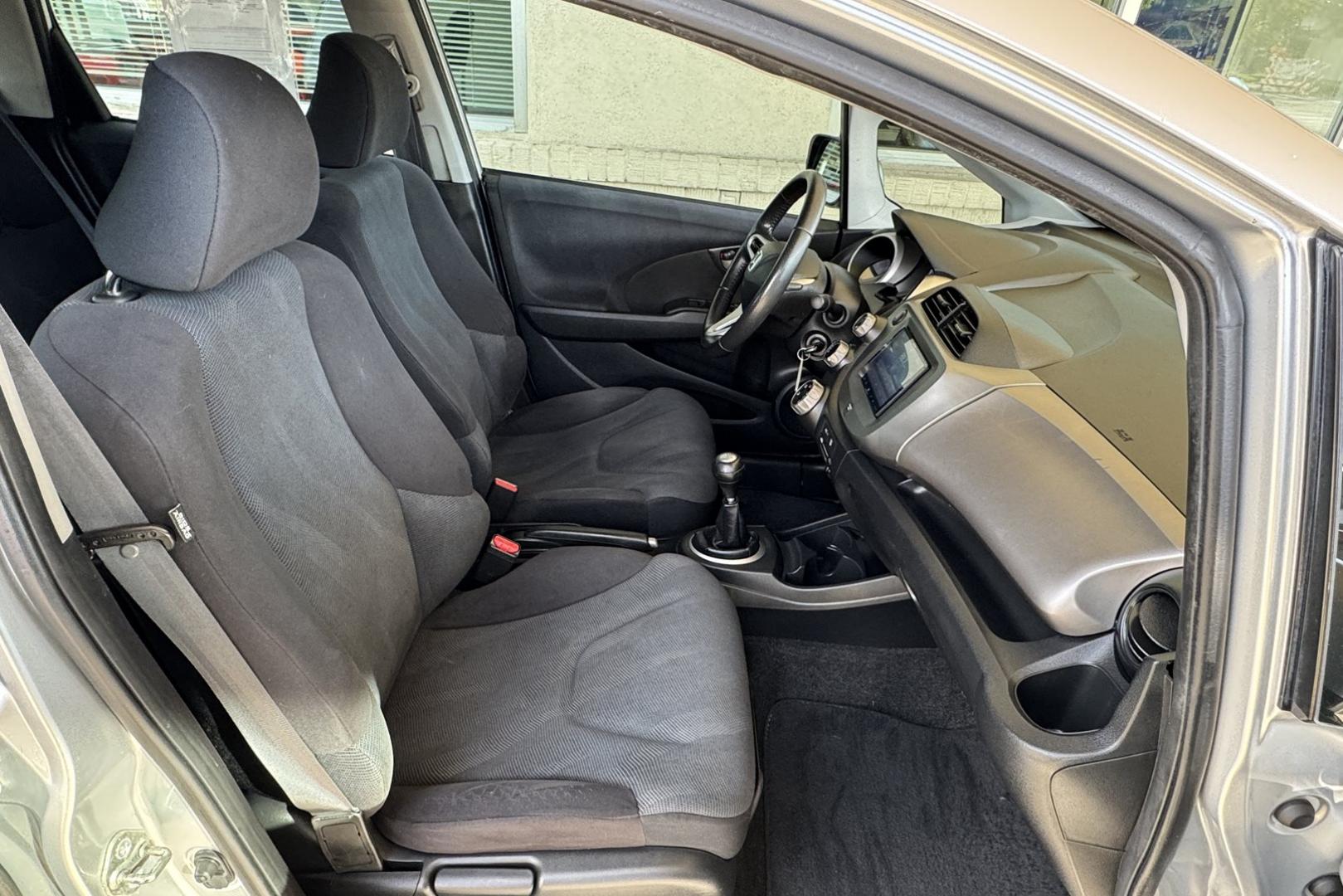 2011 Silver /Black Honda Fit Sport (JHMGE8G59BC) with an 4 Cyl 1.5 Liter engine, 5 Speed Manual transmission, located at 2304 W. Main St., Boise, ID, 83702, (208) 342-7777, 43.622105, -116.218658 - 5 Speed, Great Fuel Economy! - Photo#9