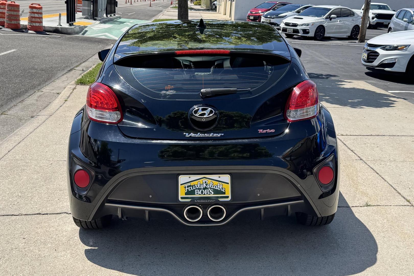 2013 Black /Black/Blue Hyundai Veloster Turbo Coupe (KMHTC6AE3DU) with an 4 Cyl 1.6 Liter Turbo engine, Automatic 6 Speed transmission, located at 2304 W. Main St., Boise, ID, 83702, (208) 342-7777, 43.622105, -116.218658 - Low Mileage Veloster! - Photo#1