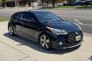 2013 Black /Black/Blue Hyundai Veloster Turbo Coupe (KMHTC6AE3DU) with an 4 Cyl 1.6 Liter Turbo engine, Automatic 6 Speed transmission, located at 2304 W. Main St., Boise, ID, 83702, (208) 342-7777, 43.622105, -116.218658 - Low Mileage Veloster! - Photo#2