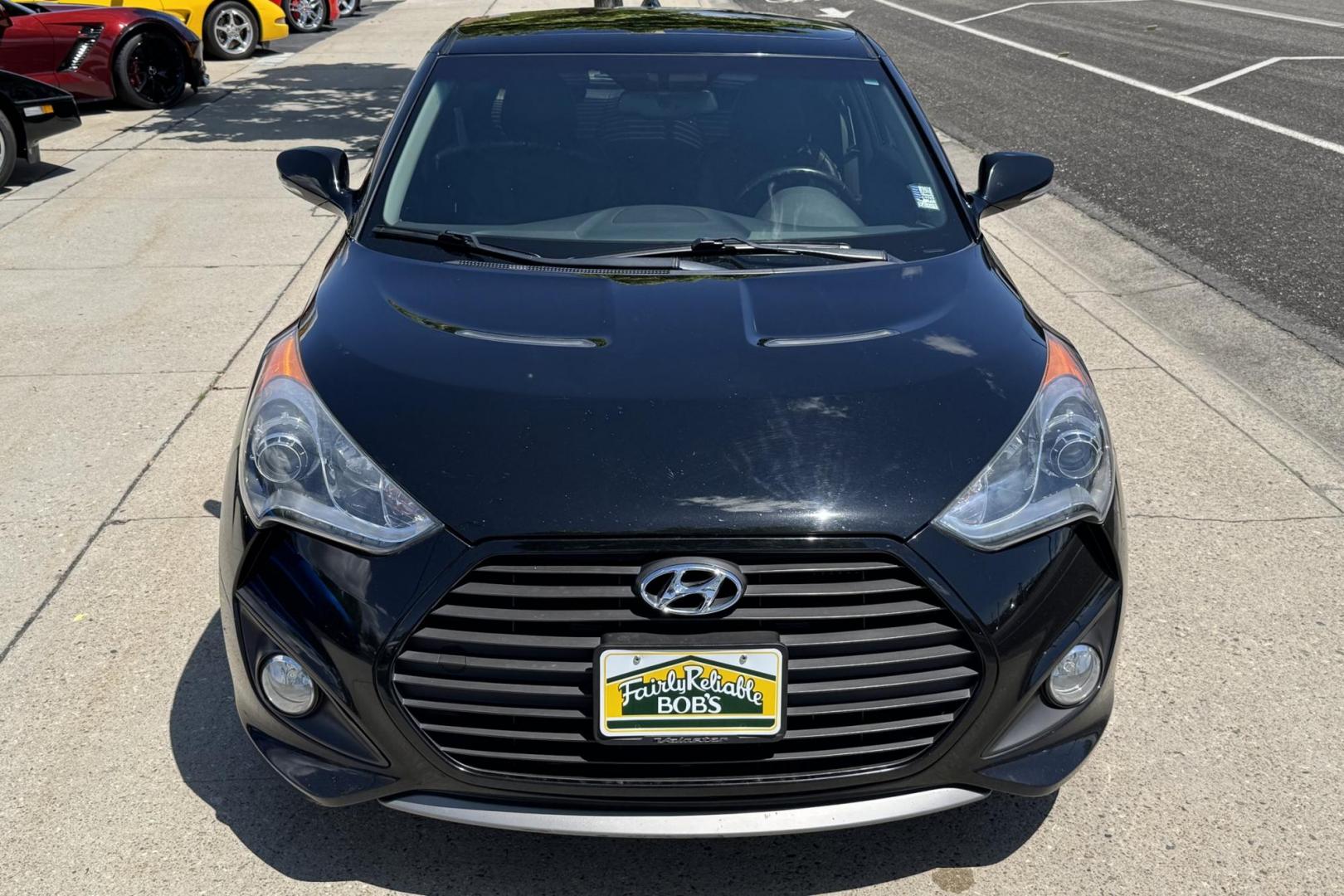 2013 Black /Black/Blue Hyundai Veloster Turbo Coupe (KMHTC6AE3DU) with an 4 Cyl 1.6 Liter Turbo engine, Automatic 6 Speed transmission, located at 2304 W. Main St., Boise, ID, 83702, (208) 342-7777, 43.622105, -116.218658 - Low Mileage Veloster! - Photo#3