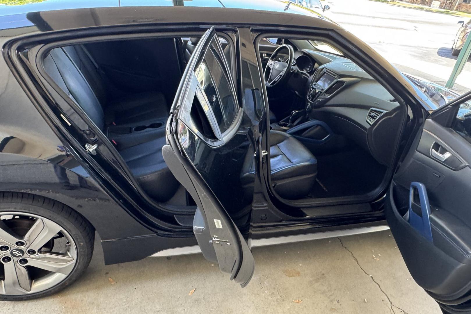 2013 Black /Black/Blue Hyundai Veloster Turbo Coupe (KMHTC6AE3DU) with an 4 Cyl 1.6 Liter Turbo engine, Automatic 6 Speed transmission, located at 2304 W. Main St., Boise, ID, 83702, (208) 342-7777, 43.622105, -116.218658 - Low Mileage Veloster! - Photo#14