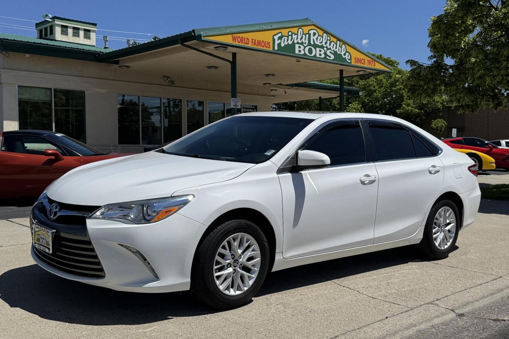 2017 Super White /Black Toyota Camry LE (4T1BF1FK3HU) with an 4 Cyl 2.5 Liter engine, Automatic transmission, located at 2304 W. Main St., Boise, ID, 83702, (208) 342-7777, 43.622105, -116.218658 - Sunroof, New Tires, Power Seat And Back Up Camera! - Photo#0