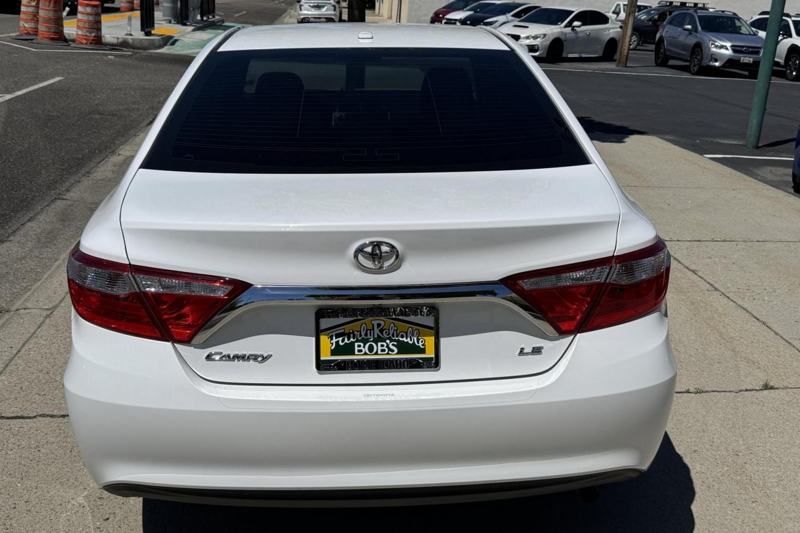 2017 Super White /Black Toyota Camry LE (4T1BF1FK3HU) with an 4 Cyl 2.5 Liter engine, Automatic transmission, located at 2304 W. Main St., Boise, ID, 83702, (208) 342-7777, 43.622105, -116.218658 - Sunroof, New Tires, Power Seat And Back Up Camera! - Photo#1