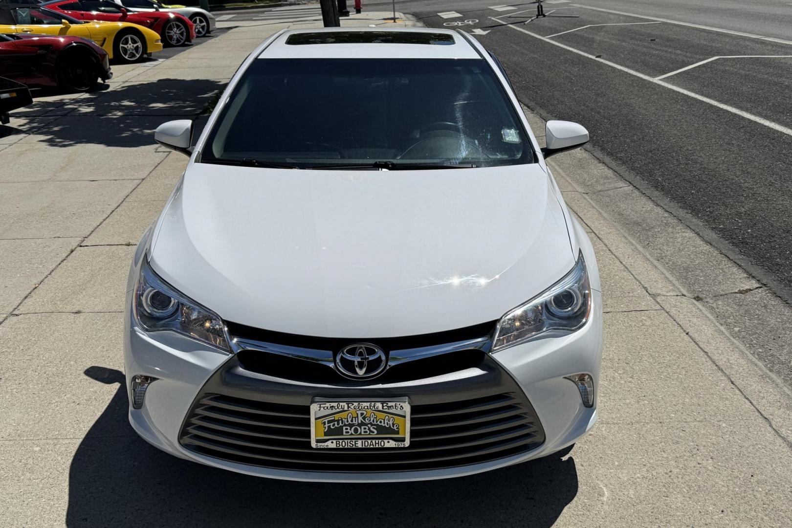 2017 Super White /Black Toyota Camry LE (4T1BF1FK3HU) with an 4 Cyl 2.5 Liter engine, Automatic transmission, located at 2304 W. Main St., Boise, ID, 83702, (208) 342-7777, 43.622105, -116.218658 - Sunroof, New Tires, Power Seat And Back Up Camera! - Photo#3