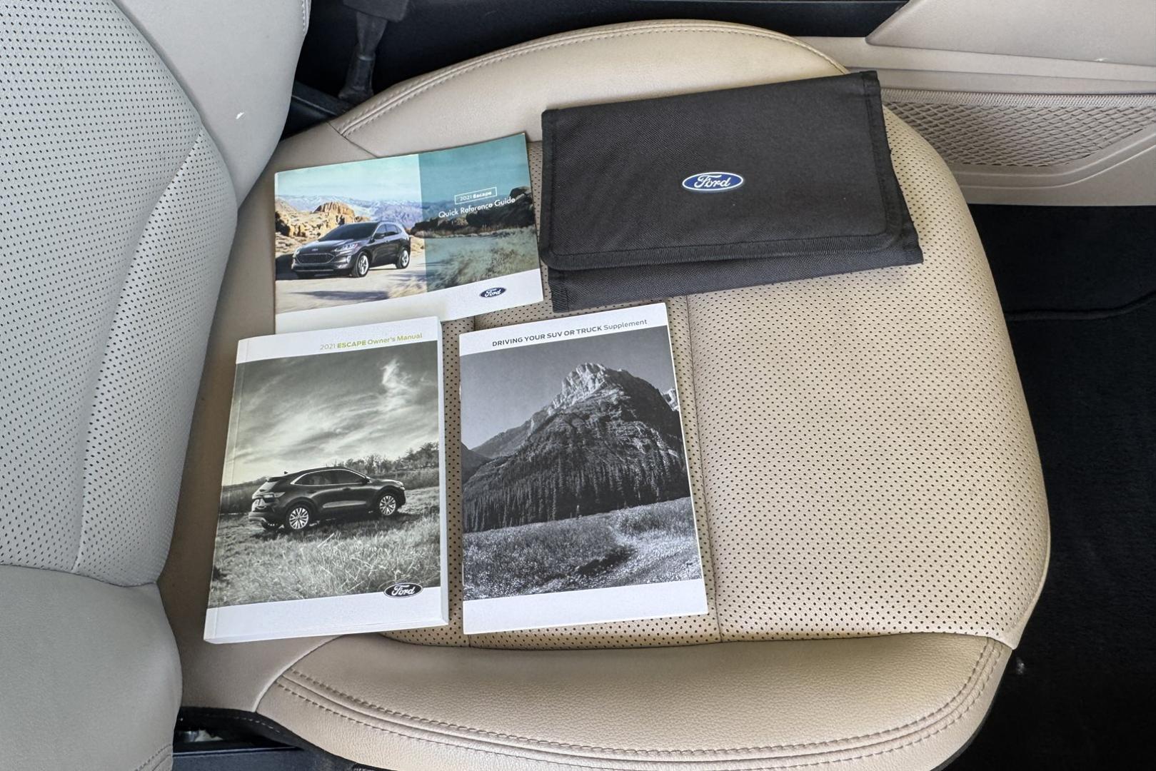 2021 White /Tan/Black Ford Escape Titanium (1FMCU9J92MU) with an 4 Cyl 2.0 Liter Turbo engine, Automatic 8 Speed transmission, located at 2304 W. Main St., Boise, ID, 83702, (208) 342-7777, 43.622105, -116.218658 - New Tires! Great Fuel Economy! Loaded With Safety Features - Photo#17