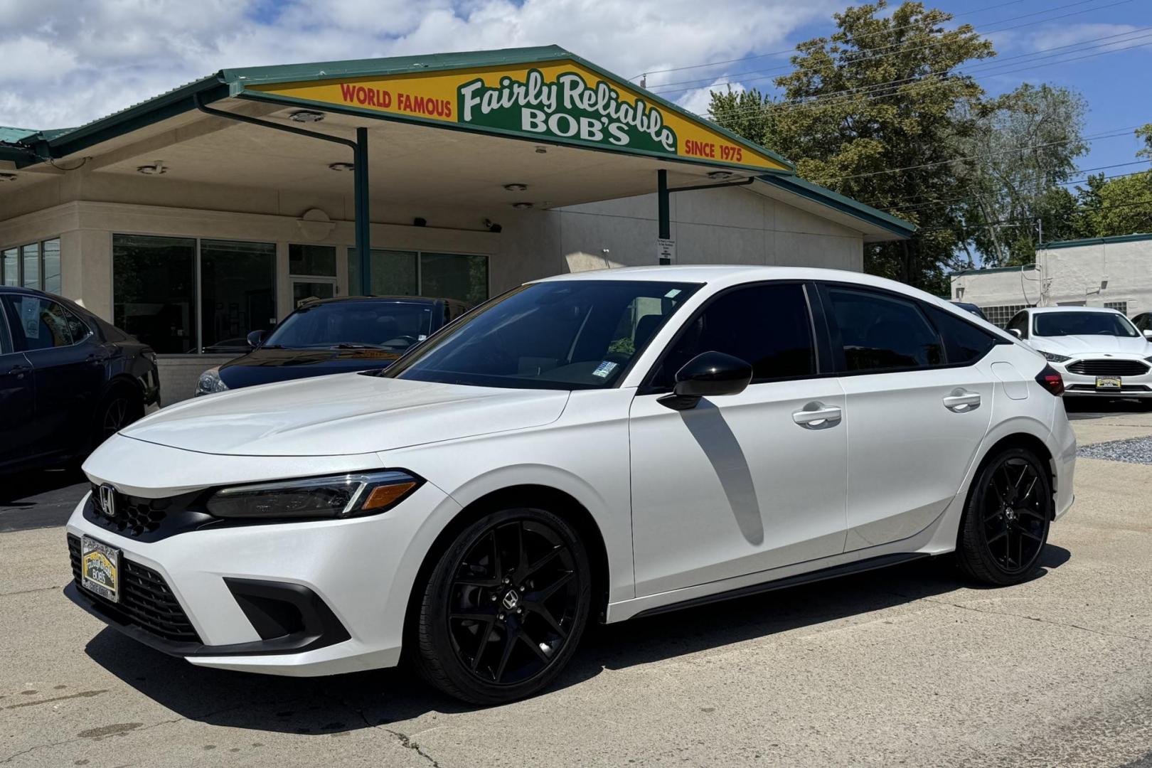 2024 White /Black Honda Civic Hatchback Sport (19XFL2H80RE) with an 4 Cyl 2.0 Liter engine, Automatic transmission, located at 2304 W. Main St., Boise, ID, 83702, (208) 342-7777, 43.622105, -116.218658 - Remaining Factory Warranty! Fun To Drive! - Photo#0