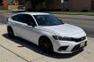 2024 White /Black Honda Civic Hatchback Sport (19XFL2H80RE) with an 4 Cyl 2.0 Liter engine, Automatic transmission, located at 2304 W. Main St., Boise, ID, 83702, (208) 342-7777, 43.622105, -116.218658 - Remaining Factory Warranty! Fun To Drive! - Photo#2
