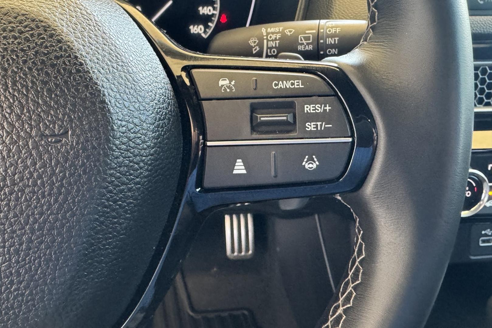 2024 White /Black Honda Civic Hatchback Sport (19XFL2H80RE) with an 4 Cyl 2.0 Liter engine, Automatic transmission, located at 2304 W. Main St., Boise, ID, 83702, (208) 342-7777, 43.622105, -116.218658 - Remaining Factory Warranty! Fun To Drive! - Photo#7