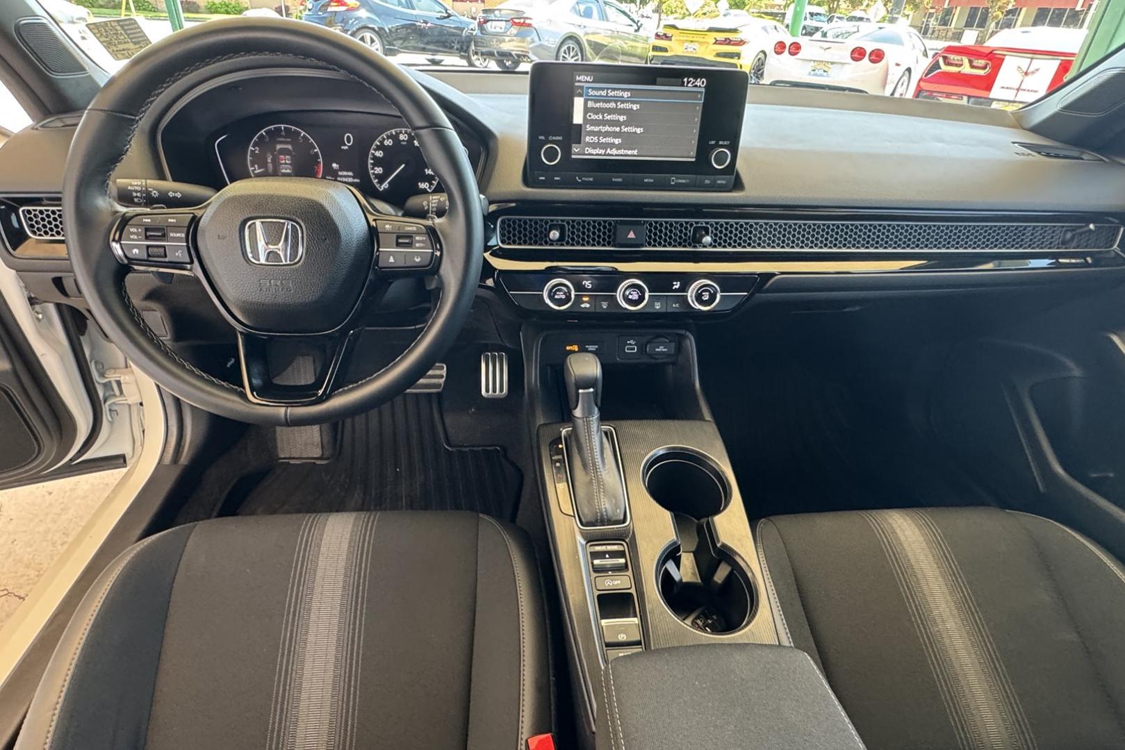 2024 White /Black Honda Civic Hatchback Sport (19XFL2H80RE) with an 4 Cyl 2.0 Liter engine, Automatic transmission, located at 2304 W. Main St., Boise, ID, 83702, (208) 342-7777, 43.622105, -116.218658 - Remaining Factory Warranty! Fun To Drive! - Photo#11