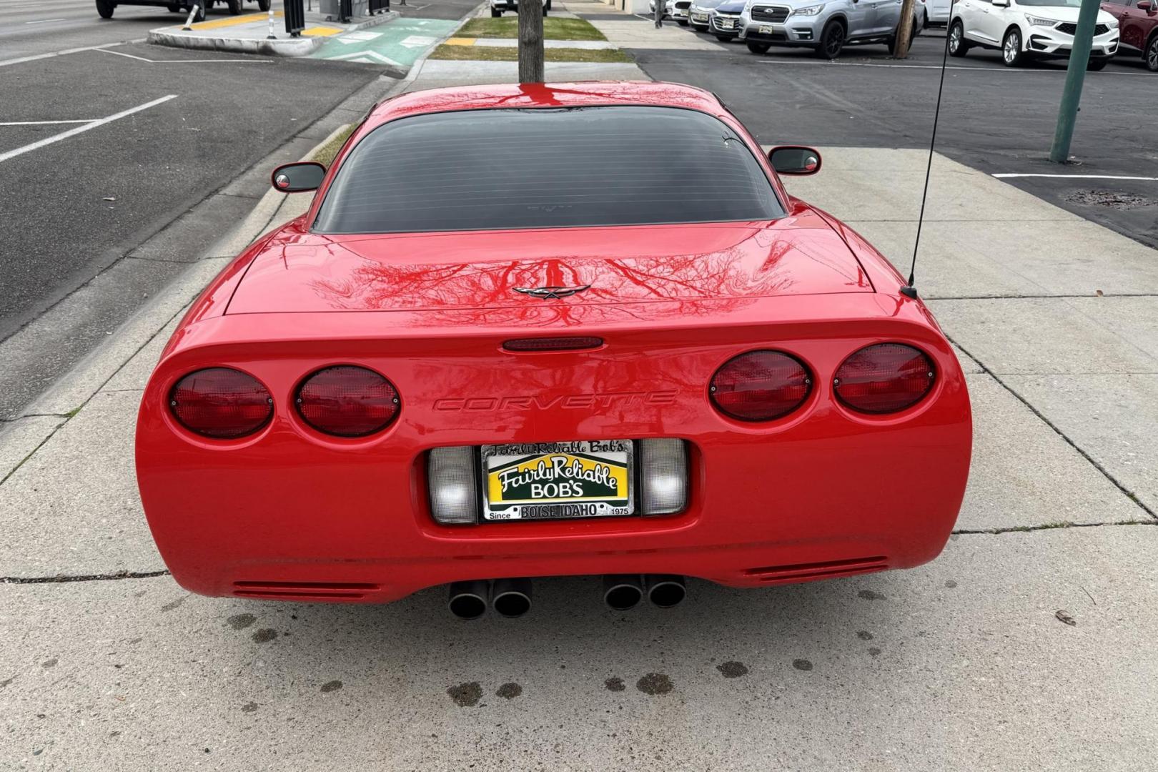 2002 Victory Red /Red/Black Chevrolet Corvette Z06 (1G1YY12S725) with an V8 5.7 Liter engine, 6 Speed Manual transmission, located at 2304 W. Main St., Boise, ID, 83702, (208) 342-7777, 43.622105, -116.218658 - LS6 405 Horse Power! - Photo#1