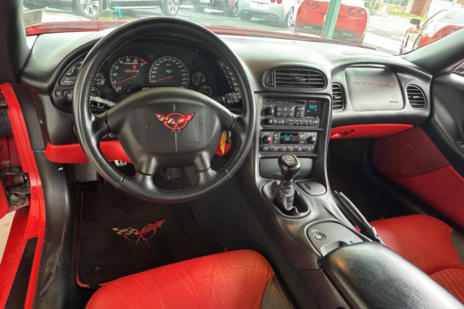 2002 Victory Red /Red/Black Chevrolet Corvette Z06 (1G1YY12S725) with an V8 5.7 Liter engine, 6 Speed Manual transmission, located at 2304 W. Main St., Boise, ID, 83702, (208) 342-7777, 43.622105, -116.218658 - LS6 405 Horse Power! - Photo#6