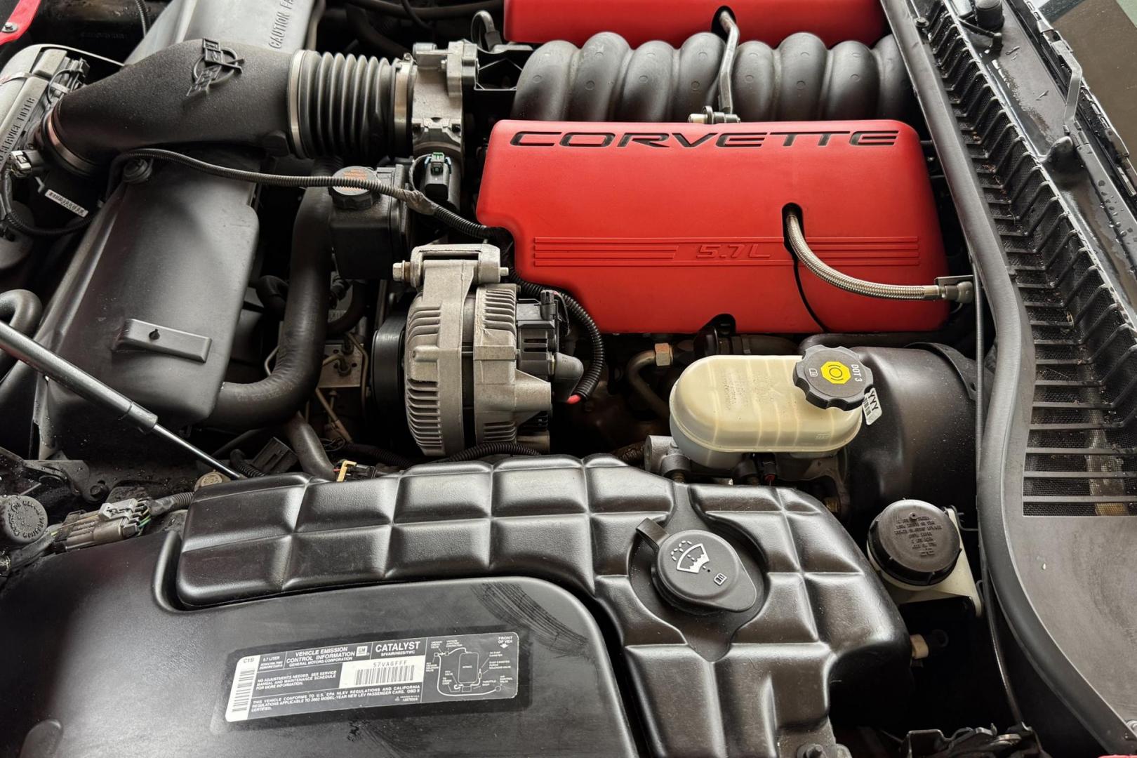 2002 Victory Red /Red/Black Chevrolet Corvette Z06 (1G1YY12S725) with an V8 5.7 Liter engine, 6 Speed Manual transmission, located at 2304 W. Main St., Boise, ID, 83702, (208) 342-7777, 43.622105, -116.218658 - LS6 405 Horse Power! - Photo#8