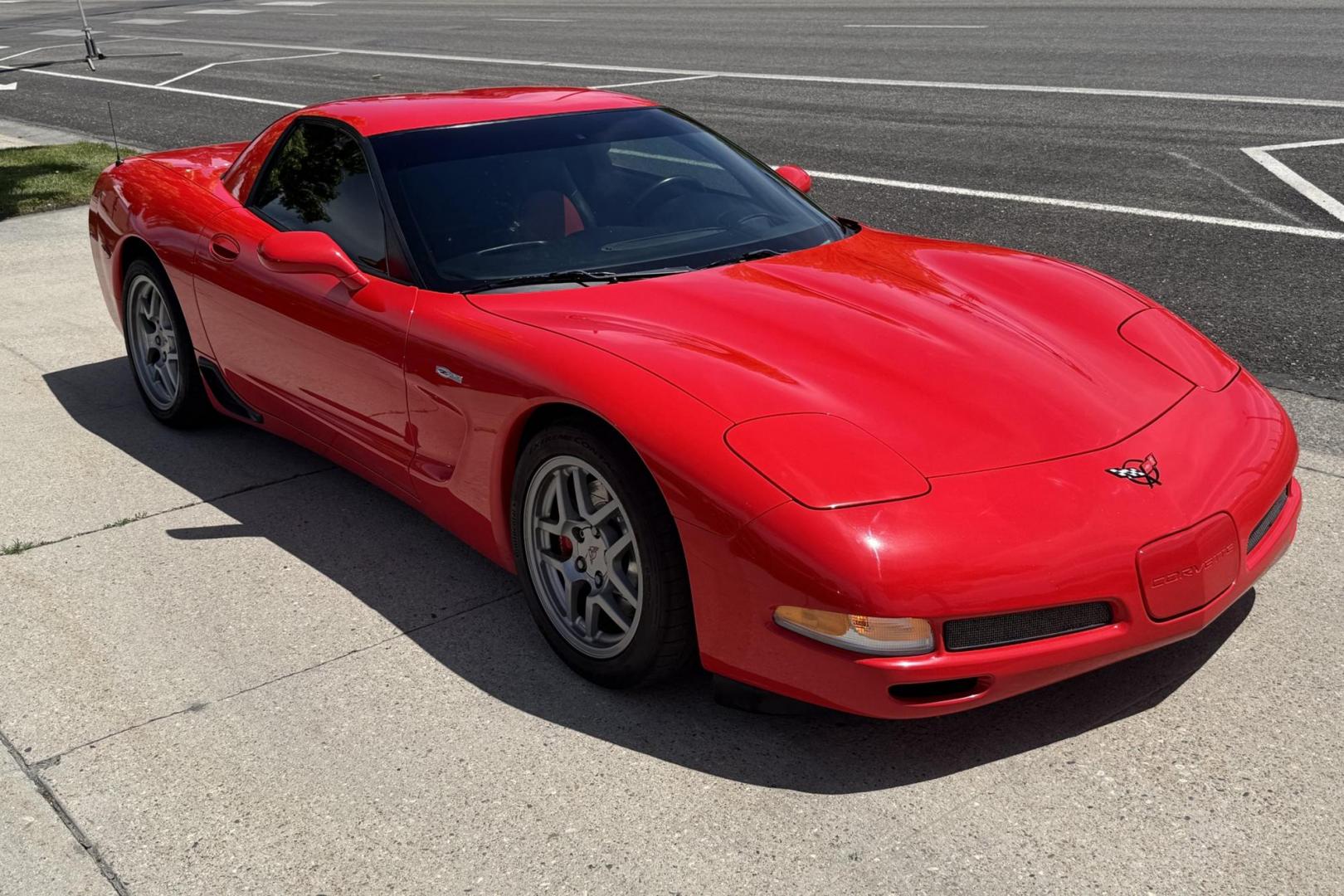 2002 Victory Red /Red/Black Chevrolet Corvette Z06 (1G1YY12S725) with an V8 5.7 Liter engine, 6 Speed Manual transmission, located at 2304 W. Main St., Boise, ID, 83702, (208) 342-7777, 43.622105, -116.218658 - LS6 405 Horse Power! - Photo#2
