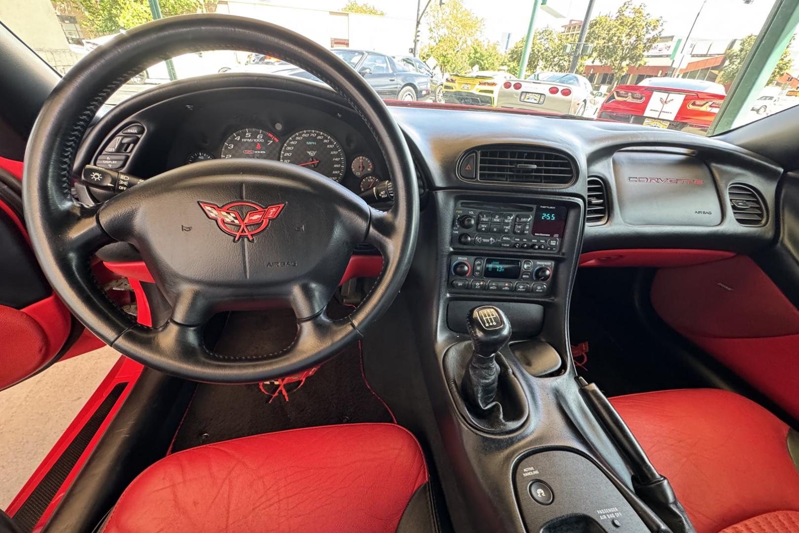 2002 Victory Red /Red/Black Chevrolet Corvette Z06 (1G1YY12S725) with an V8 5.7 Liter engine, 6 Speed Manual transmission, located at 2304 W. Main St., Boise, ID, 83702, (208) 342-7777, 43.622105, -116.218658 - LS6 405 Horse Power! - Photo#6