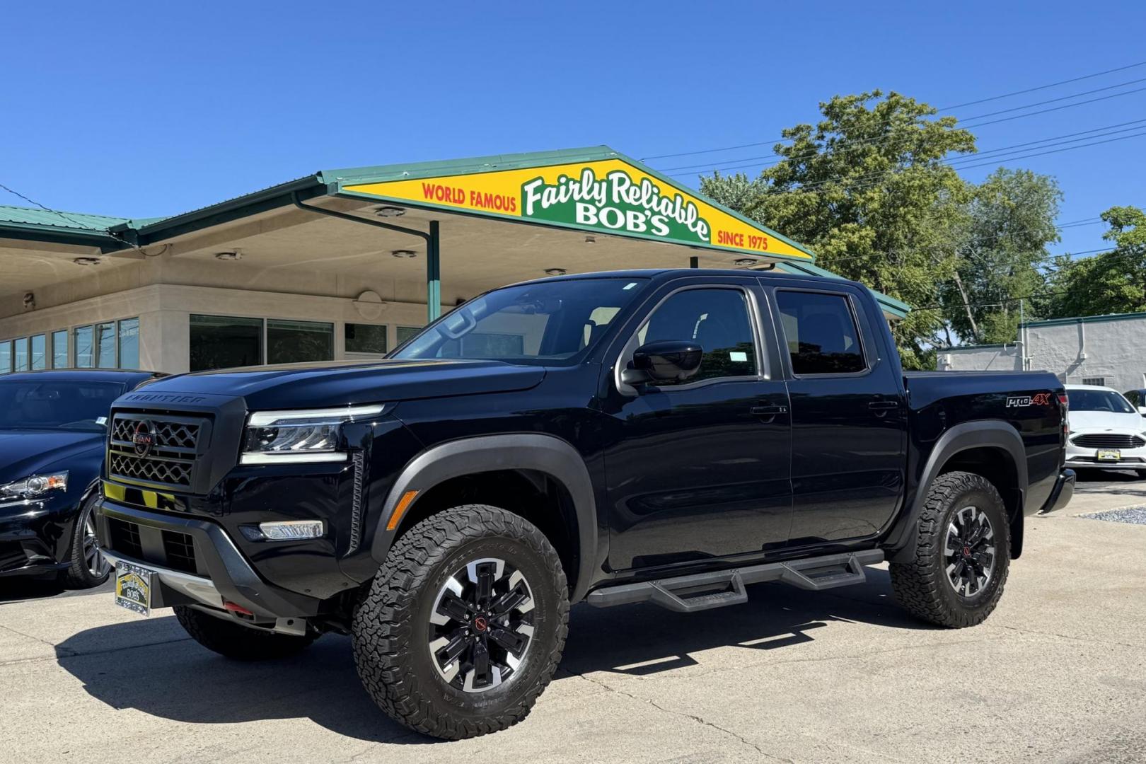 2023 Black /Black Nissan Frontier PRO-4X (1N6ED1EKXPN) with an V6 3.8 Liter engine, Automatic 9 Speed transmission, located at 2304 W. Main St., Boise, ID, 83702, (208) 342-7777, 43.622105, -116.218658 - Remaining Factory Warranty! Really Cool Truck! - Photo#0