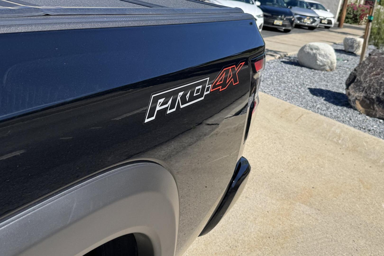 2023 Black /Black Nissan Frontier PRO-4X (1N6ED1EKXPN) with an V6 3.8 Liter engine, Automatic 9 Speed transmission, located at 2304 W. Main St., Boise, ID, 83702, (208) 342-7777, 43.622105, -116.218658 - Remaining Factory Warranty! Really Cool Truck! - Photo#4