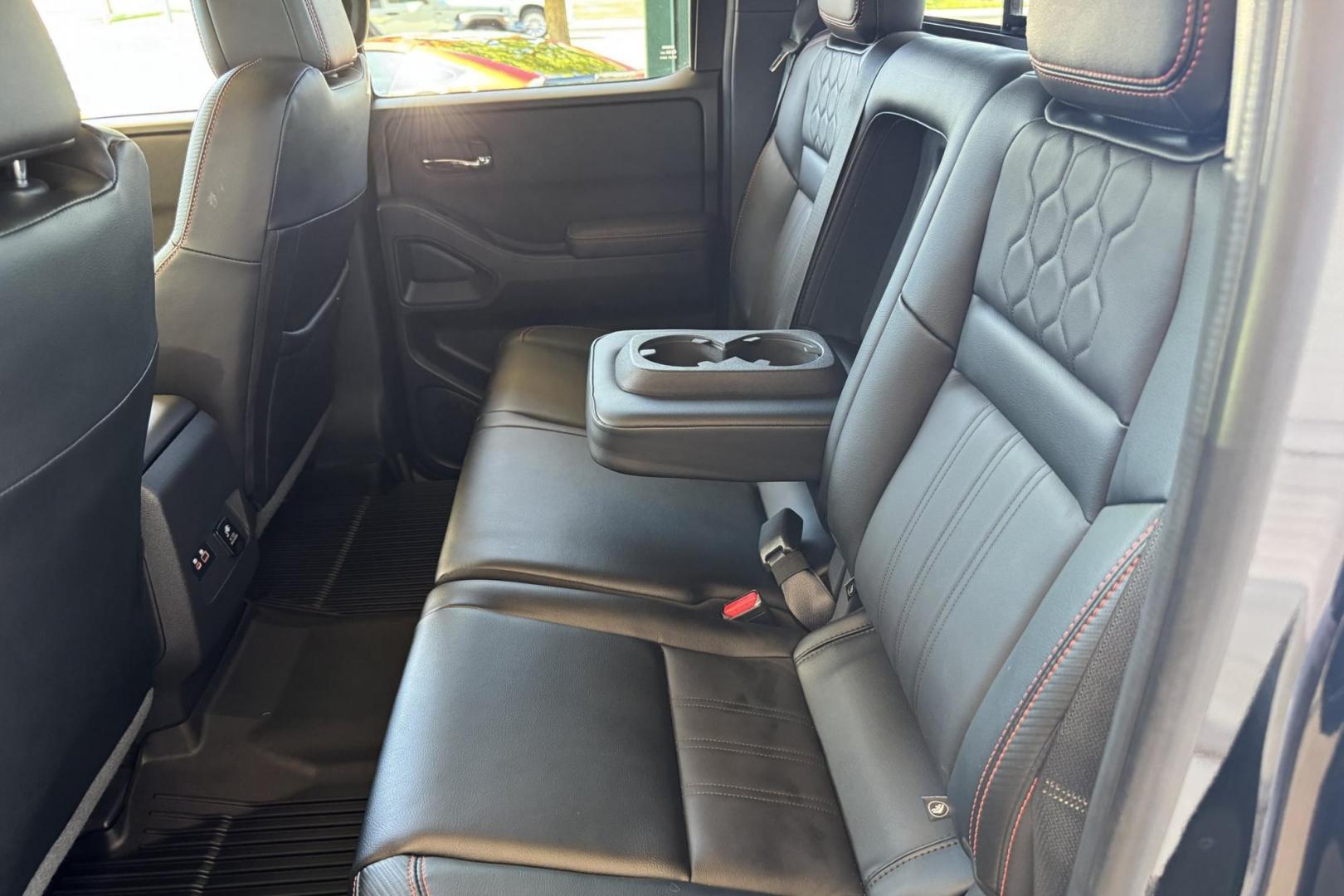 2023 Black /Black Nissan Frontier PRO-4X (1N6ED1EKXPN) with an V6 3.8 Liter engine, Automatic 9 Speed transmission, located at 2304 W. Main St., Boise, ID, 83702, (208) 342-7777, 43.622105, -116.218658 - Remaining Factory Warranty! Really Cool Truck! - Photo#16
