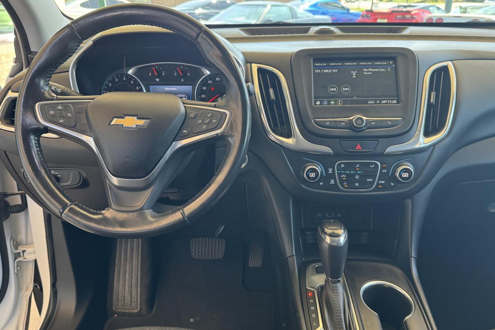 2019 Summit White /Black Chevrolet Equinox LT (2GNAXUEV1K6) with an 4 Cyl 1.5 Liter Turbo engine, Automatic 6 Speed transmission, located at 2304 W. Main St., Boise, ID, 83702, (208) 342-7777, 43.622105, -116.218658 - Photo#14