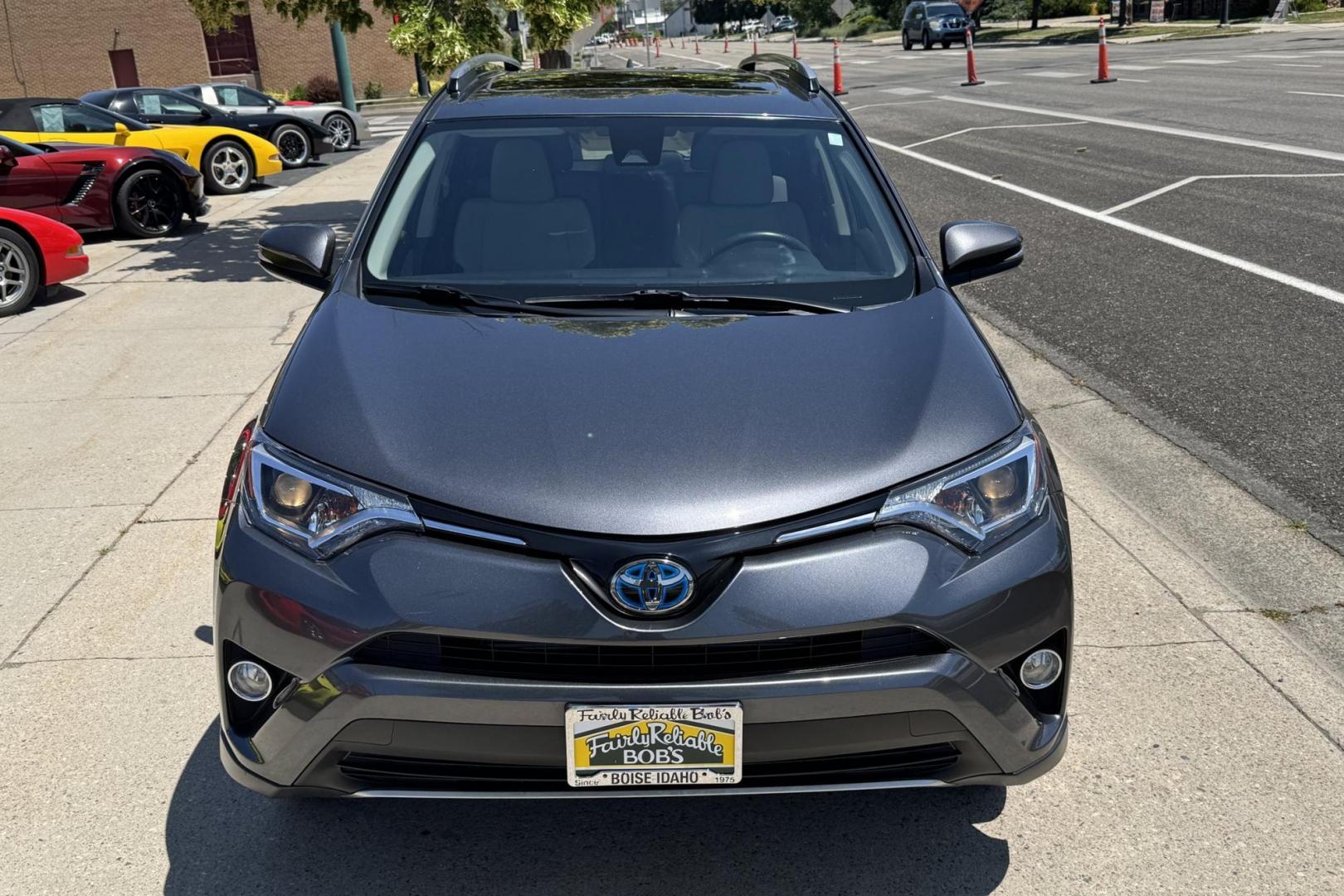 2017 Magnetite Gray Metallic /Gray Toyota RAV4 Hybrid XLE (JTMRJREV3HD) with an 4 Cyl 2.5 Liter Hybrid engine, Automatic transmission, located at 2304 W. Main St., Boise, ID, 83702, (208) 342-7777, 43.622105, -116.218658 - Hybrid All Wheel Drive! New Tires And Low Mileage! - Photo#4