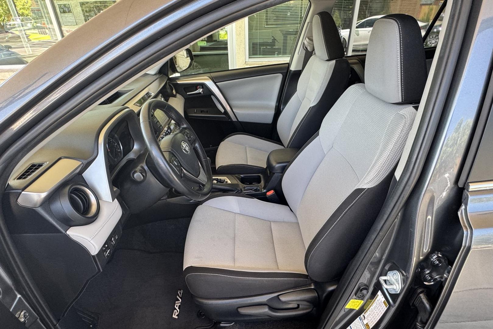 2017 Magnetite Gray Metallic /Gray Toyota RAV4 Hybrid XLE (JTMRJREV3HD) with an 4 Cyl 2.5 Liter Hybrid engine, Automatic transmission, located at 2304 W. Main St., Boise, ID, 83702, (208) 342-7777, 43.622105, -116.218658 - Hybrid All Wheel Drive! New Tires And Low Mileage! - Photo#9