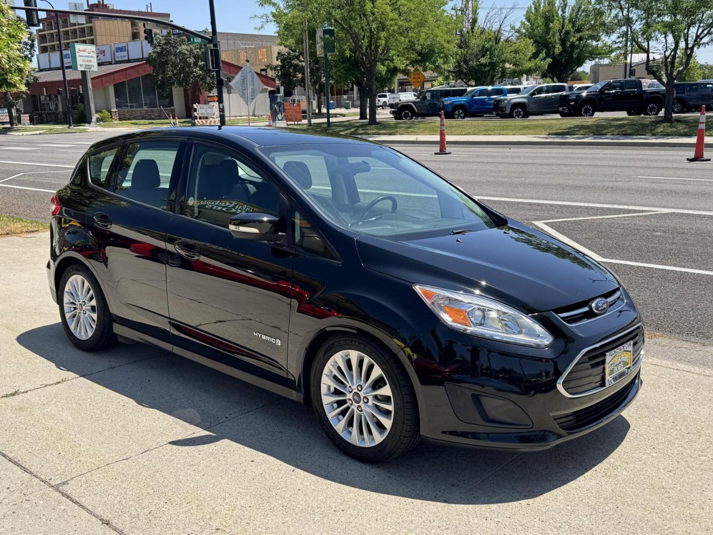 2017 Black /Gray Ford C-Max Hybrid SE (1FADP5AU7HL) with an 4 Cyl 2.0 Liter Hybrid engine, Automatic transmission, located at 2304 W. Main St., Boise, ID, 83702, (208) 342-7777, 43.622105, -116.218658 - Clean Low Mileage And Great Fuel Economy! - Photo#2