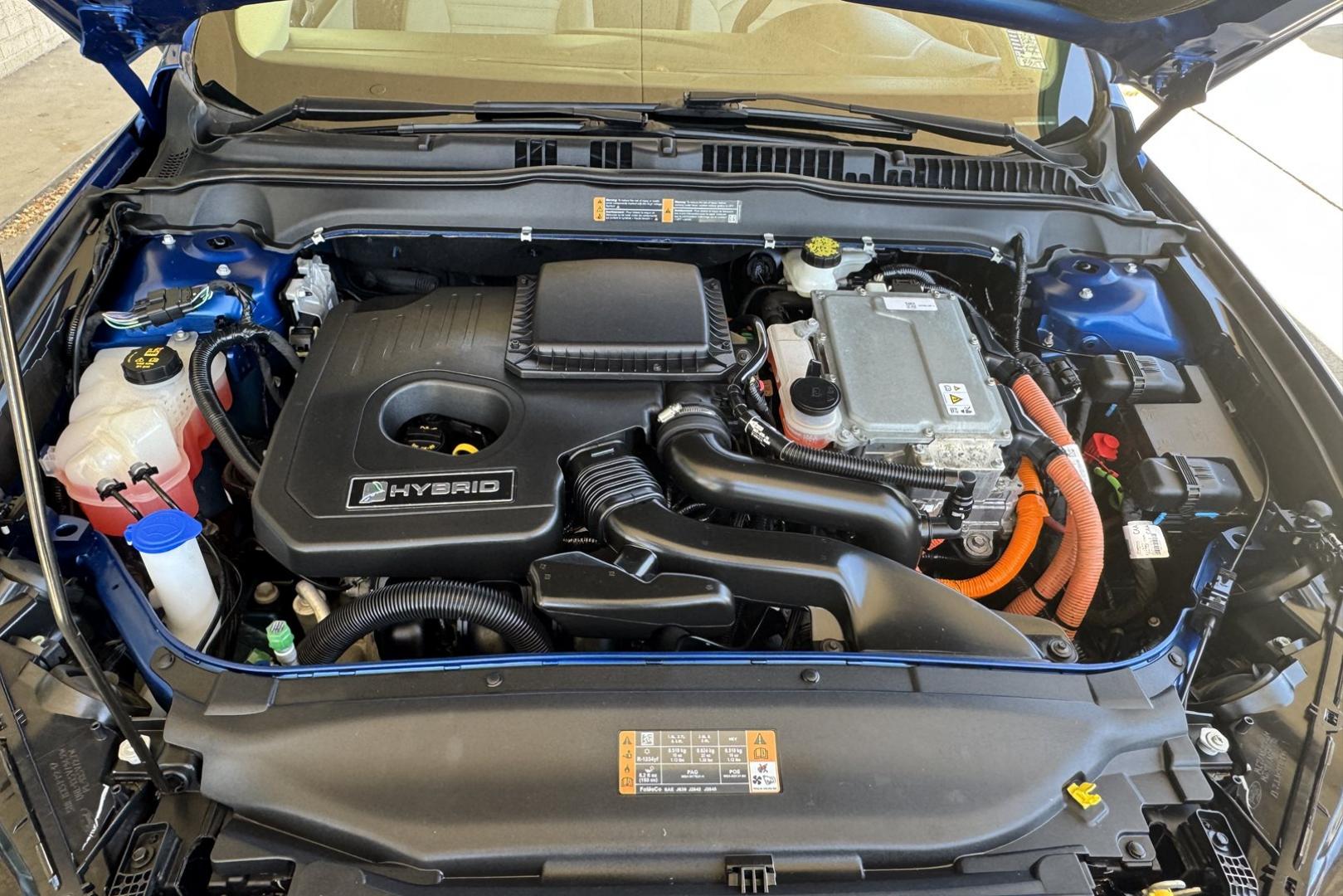 2018 Blue Lightning Metallic /Gray Ford Fusion (3FA6P0UU7JR) with an 4 Cyl 2.0 Liter Hybrid engine, Automatic transmission, located at 2304 W. Main St., Boise, ID, 83702, (208) 342-7777, 43.622105, -116.218658 - New Tires And Only 8,600 Miles!!!! - Photo#11