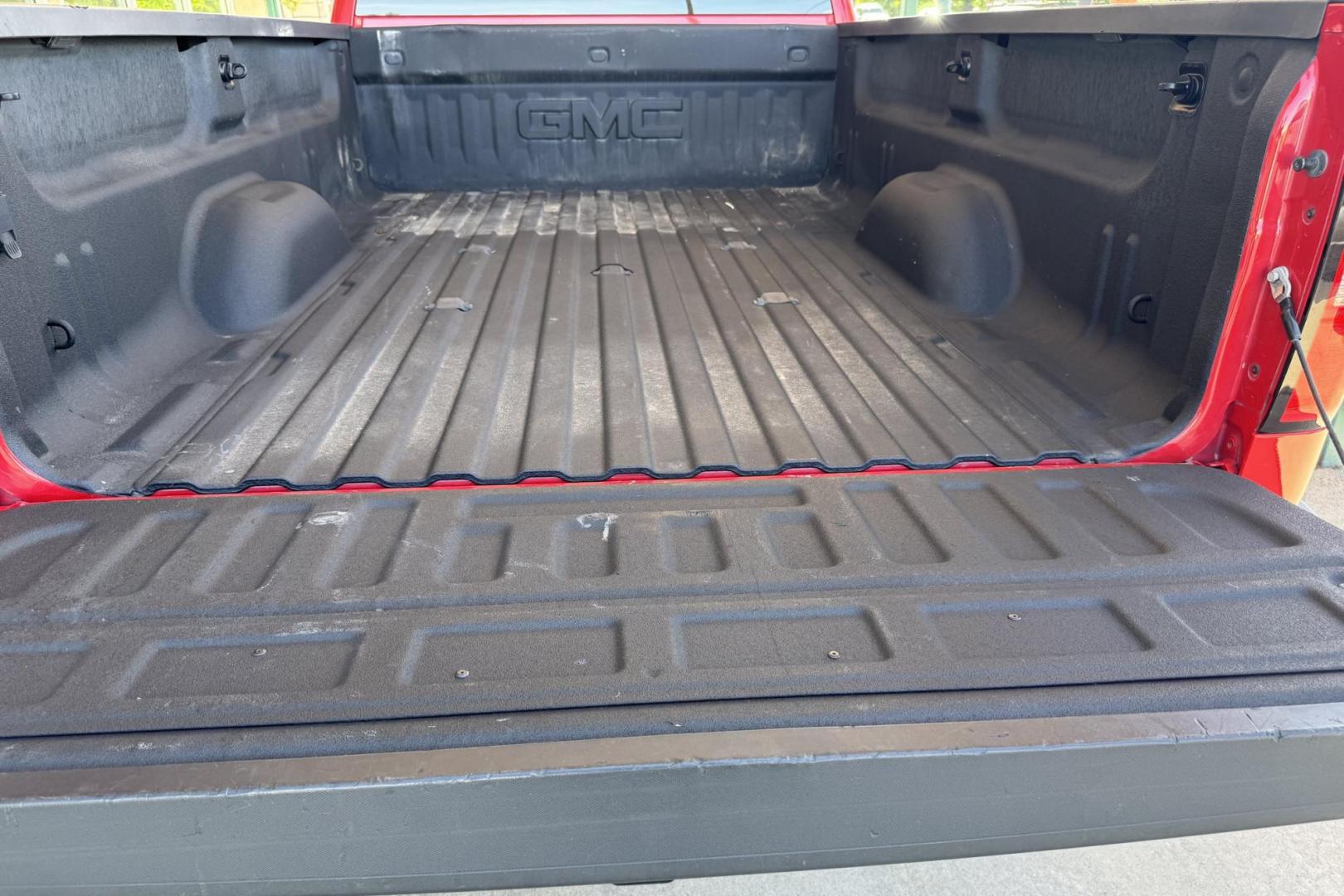 2016 Victory Red /Tan GMC Sierra 3500HD SLT (1GT42XC89GF) with an V8 6.6 Liter Turbo Duramax Diesel engine, Automatic 6 Speed With Overdrive Allison transmission, located at 2304 W. Main St., Boise, ID, 83702, (208) 342-7777, 43.622105, -116.218658 - Long Bed! Capable Hauler! - Photo#20
