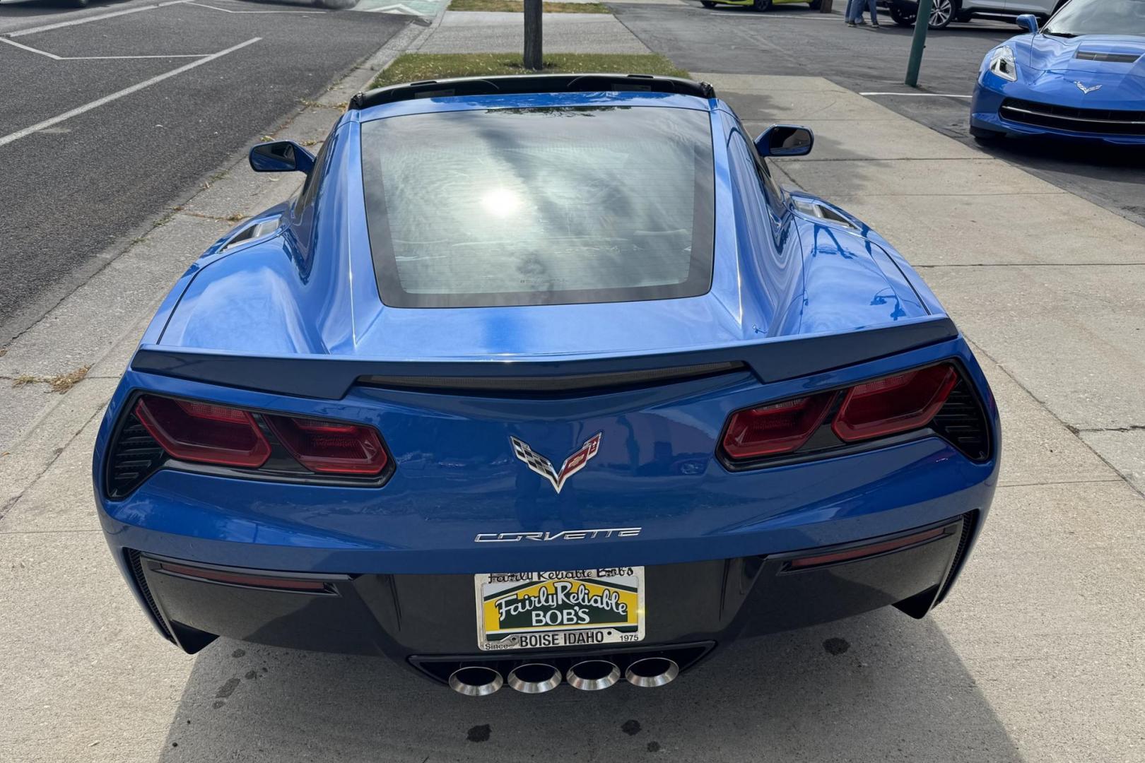 2014 Laguna Blue /Brownstone Chevrolet Corvette Stingray 3LT Z51 (1G1YL2D71E5) with an V8 6.2 Liter engine, 7 Speed Manual w/ Rev Matching transmission, located at 2304 W. Main St., Boise, ID, 83702, (208) 342-7777, 43.622105, -116.218658 - The 2014 Chevrolet Corvette Premiere Edition is a limited-production model of the Corvette Stingray, celebrating the debut of the C7 generation. Only 500 coupes were produced, exclusively in Laguna Blue with a Brownstone interior. One Owner Idaho Stingray! - Photo#1