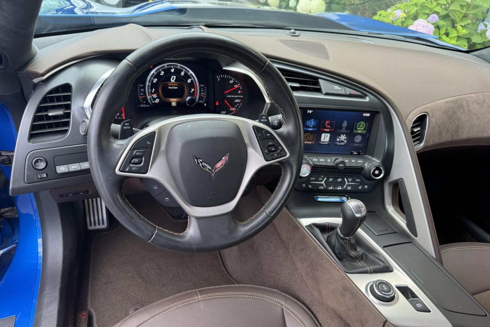 2014 Laguna Blue /Brownstone Chevrolet Corvette Stingray 3LT Z51 (1G1YL2D71E5) with an V8 6.2 Liter engine, 7 Speed Manual w/ Rev Matching transmission, located at 2304 W. Main St., Boise, ID, 83702, (208) 342-7777, 43.622105, -116.218658 - The 2014 Chevrolet Corvette Premiere Edition is a limited-production model of the Corvette Stingray, celebrating the debut of the C7 generation. Only 500 coupes were produced, exclusively in Laguna Blue with a Brownstone interior. One Owner Idaho Stingray! - Photo#9