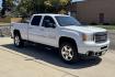 2014 Summit White /Oak GMC Sierra 2500HD Denali (1GT125E86EF) with an V8 6.6 Liter Turbo Duramax Diesel engine, Automatic 6 Speed With Overdrive Allison transmission, located at 2304 W. Main St., Boise, ID, 83702, (208) 342-7777, 43.622105, -116.218658 - Highly Optioned And Low Mileage Denali Crew Cab Long Bed! - Photo#2