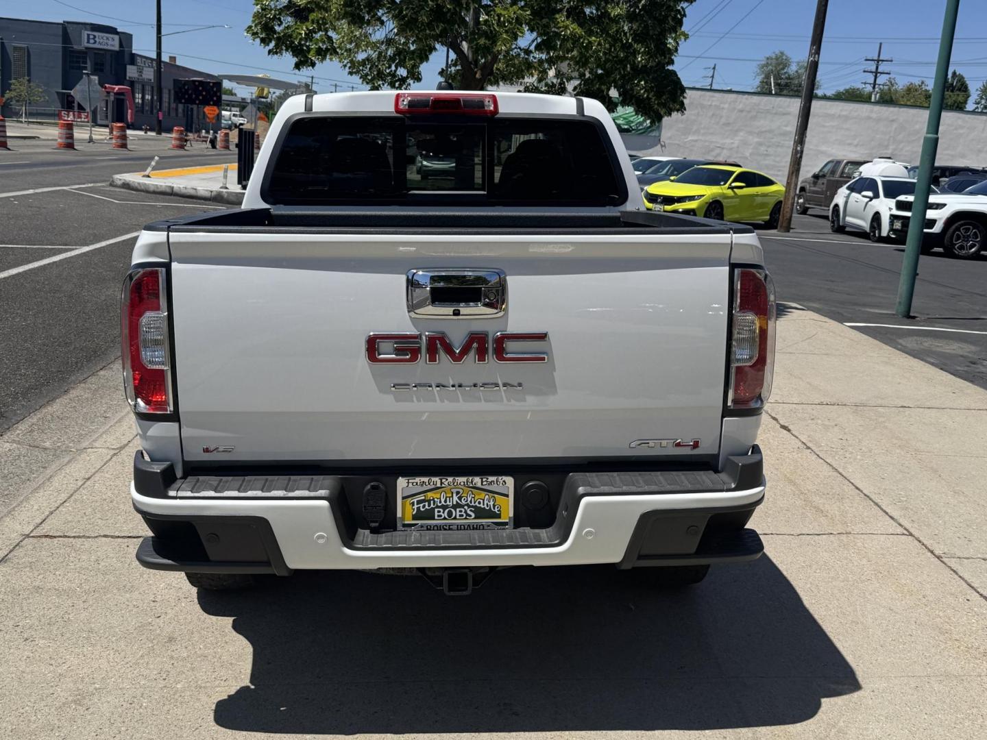 2022 Summit White /Jet Black GMC Canyon AT4 (1GTG6FEN8N1) with an V6 3.6 Liter engine, Automatic 8 Speed transmission, located at 2304 W. Main St., Boise, ID, 83702, (208) 342-7777, 43.622105, -116.218658 - Photo#1