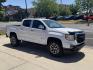 2022 Summit White /Jet Black GMC Canyon AT4 (1GTG6FEN8N1) with an V6 3.6 Liter engine, Automatic 8 Speed transmission, located at 2304 W. Main St., Boise, ID, 83702, (208) 342-7777, 43.622105, -116.218658 - Photo#2