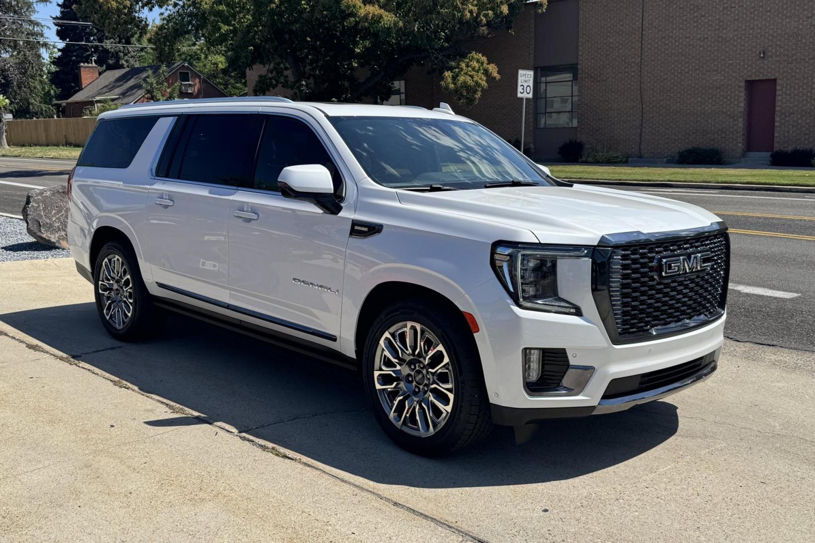 2023 White /Alpine Umber GMC Yukon Denali Ultimate (1GKS2KKT6PR) with an 6 Cyl 3.0 Liter Turbo Diesel engine, Automatic 10 Speed transmission, located at 2304 W. Main St., Boise, ID, 83702, (208) 342-7777, 43.622105, -116.218658 - Rear Entertainment System! Panoramic Sunroof! - Photo#2