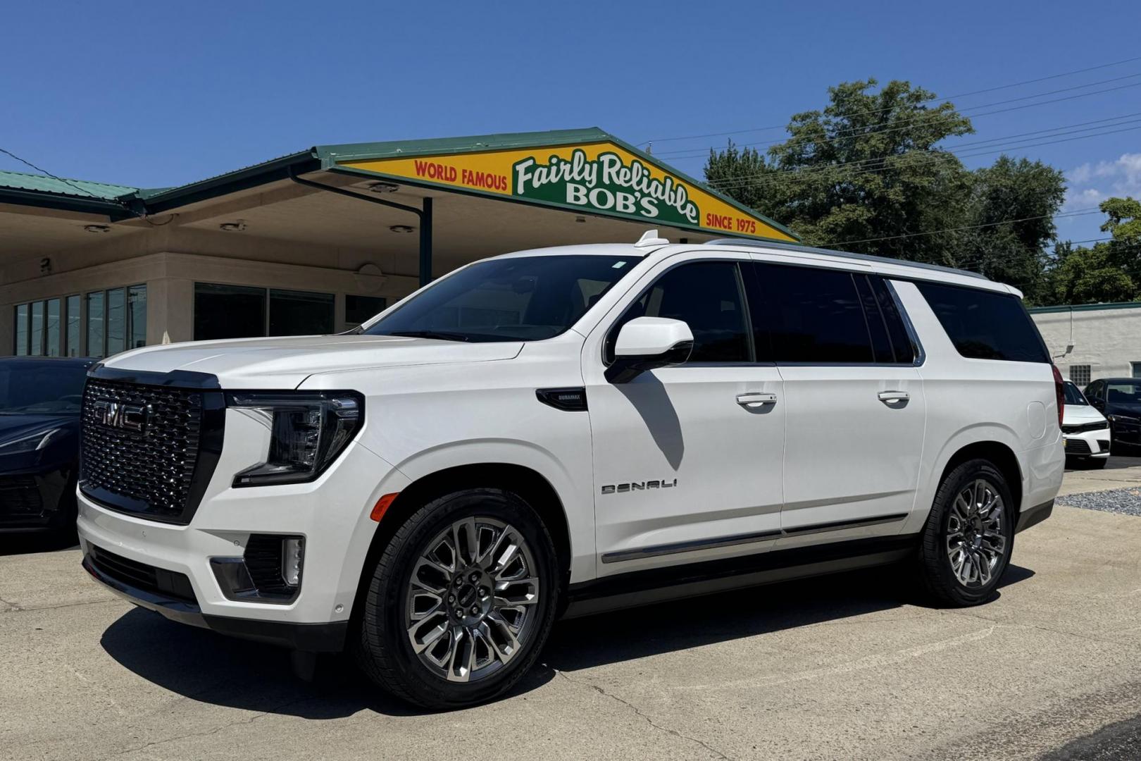 2023 White /Alpine Umber GMC Yukon Denali Ultimate (1GKS2KKT6PR) with an 6 Cyl 3.0 Liter Turbo Diesel engine, Automatic 10 Speed transmission, located at 2304 W. Main St., Boise, ID, 83702, (208) 342-7777, 43.622105, -116.218658 - Rear Entertainment System! Panoramic Sunroof! - Photo#0