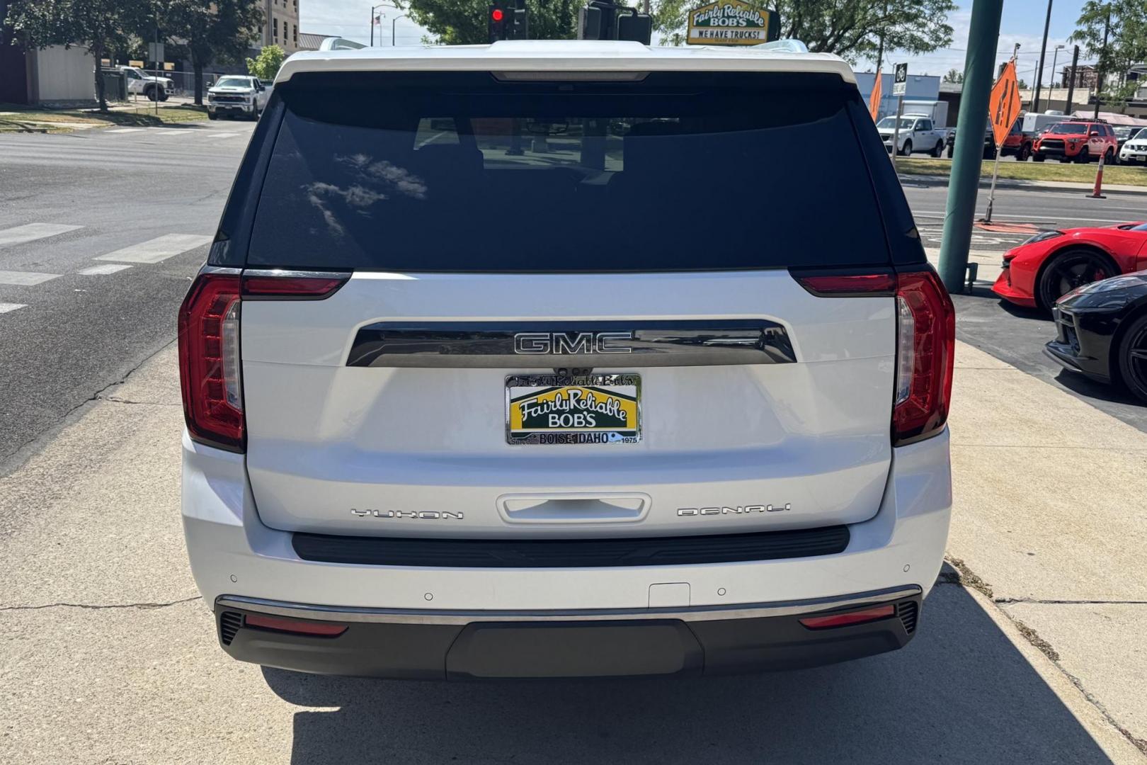 2023 White /Alpine Umber GMC Yukon Denali Ultimate (1GKS2KKT6PR) with an 6 Cyl 3.0 Liter Turbo Diesel engine, Automatic 10 Speed transmission, located at 2304 W. Main St., Boise, ID, 83702, (208) 342-7777, 43.622105, -116.218658 - Rear Entertainment System! Panoramic Sunroof! - Photo#1