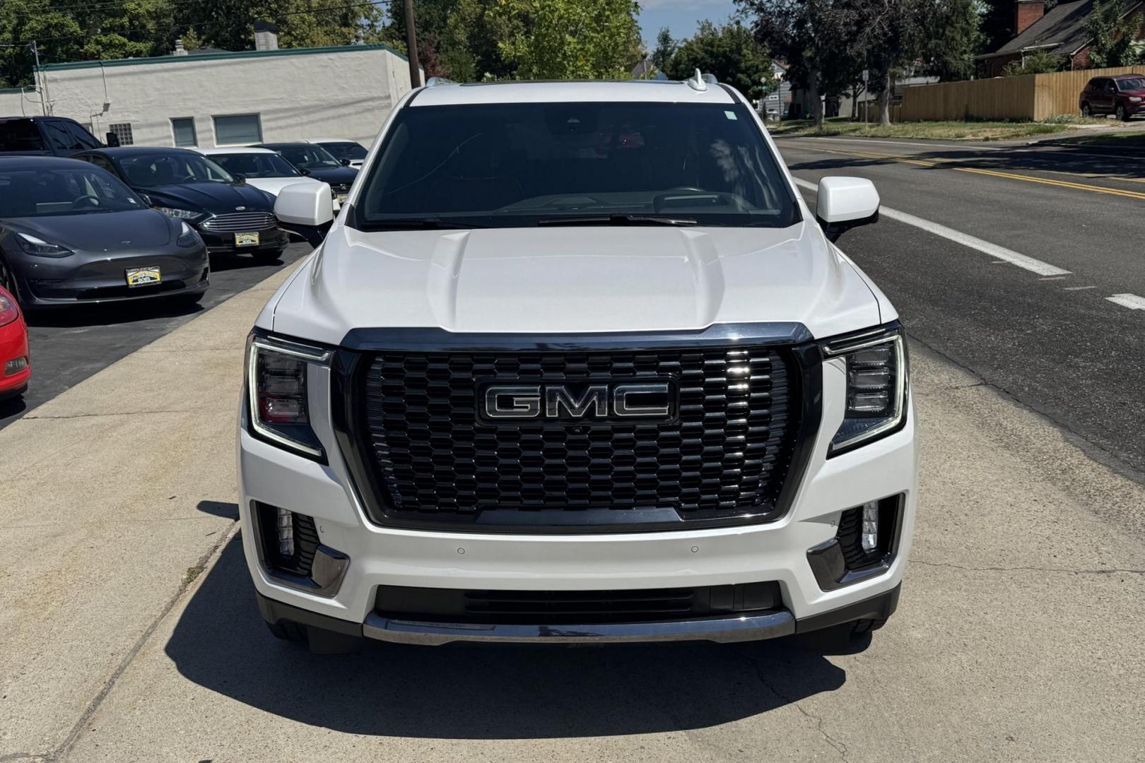 2023 White /Alpine Umber GMC Yukon Denali Ultimate (1GKS2KKT6PR) with an 6 Cyl 3.0 Liter Turbo Diesel engine, Automatic 10 Speed transmission, located at 2304 W. Main St., Boise, ID, 83702, (208) 342-7777, 43.622105, -116.218658 - Rear Entertainment System! Panoramic Sunroof! - Photo#3